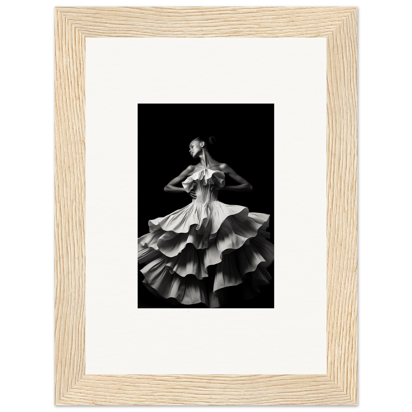 Black and white photograph of a dancer in a flowing, ruffled dress.