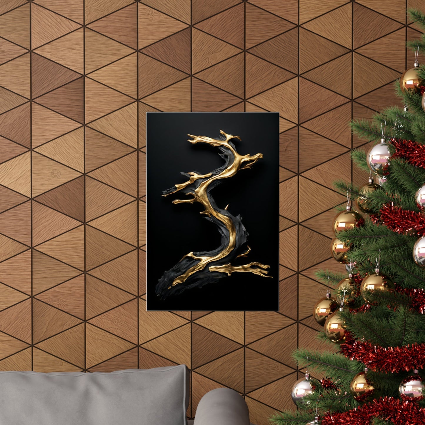 Abstract golden sculpture resembling a flowing, tree-like form on a black background.