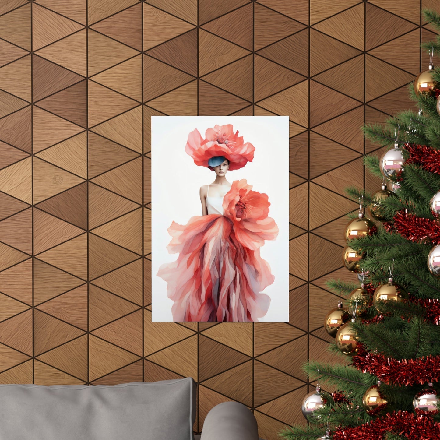 A christmas tree with a red dress hanging on it