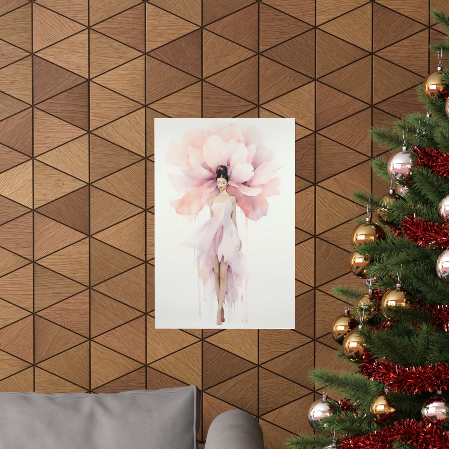 A christmas tree with a pink flower on it