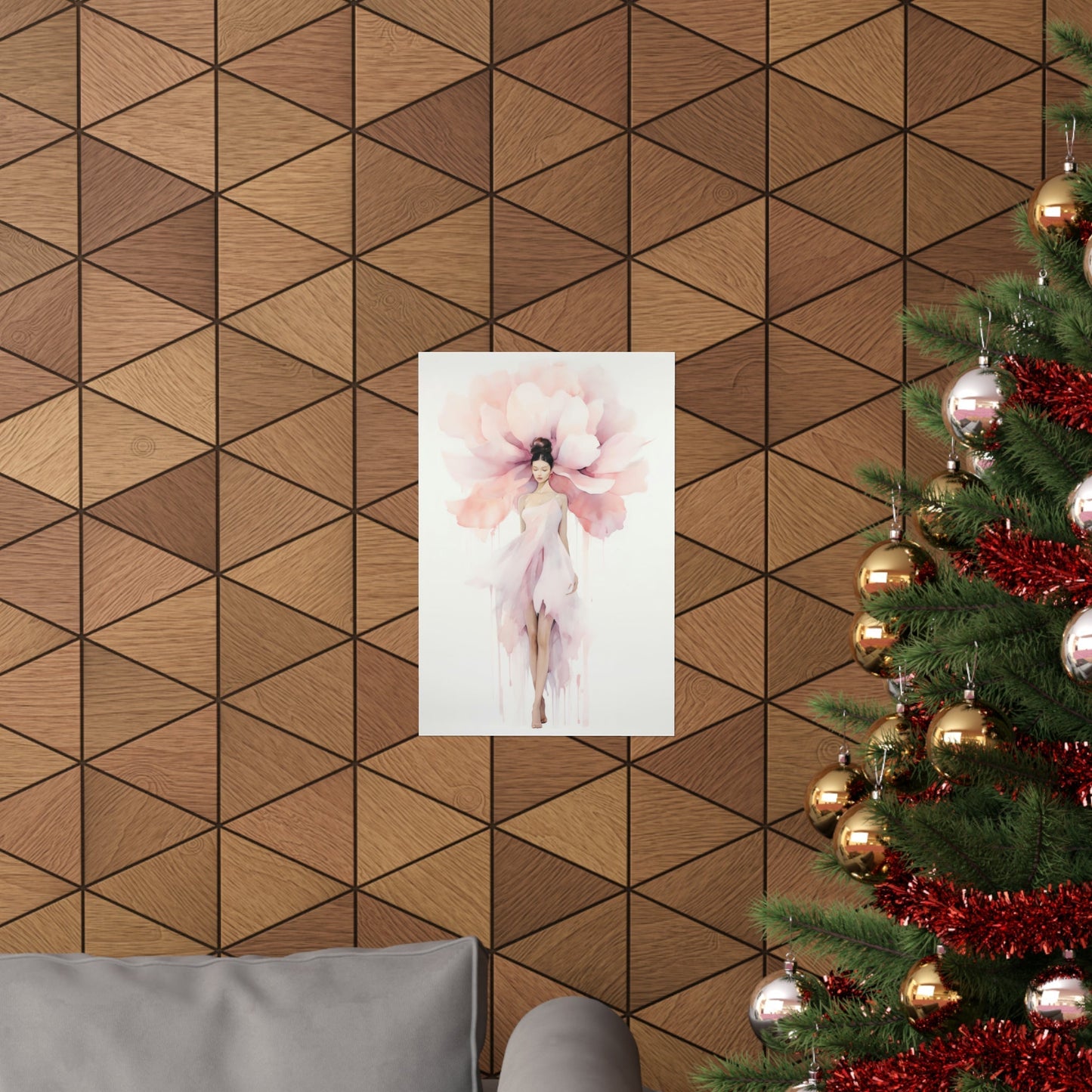 A christmas tree with a pink flower on it