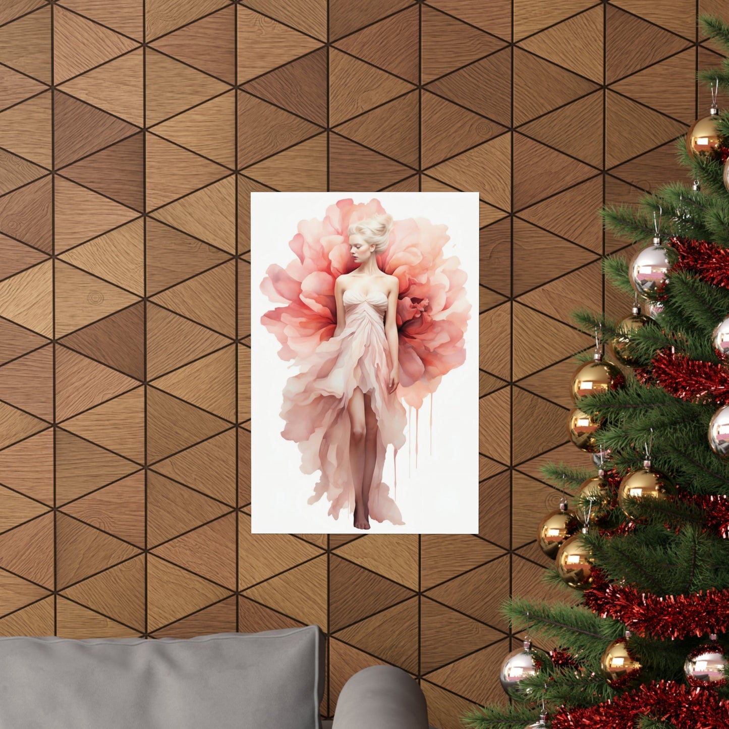 A christmas tree with a pink flower on it