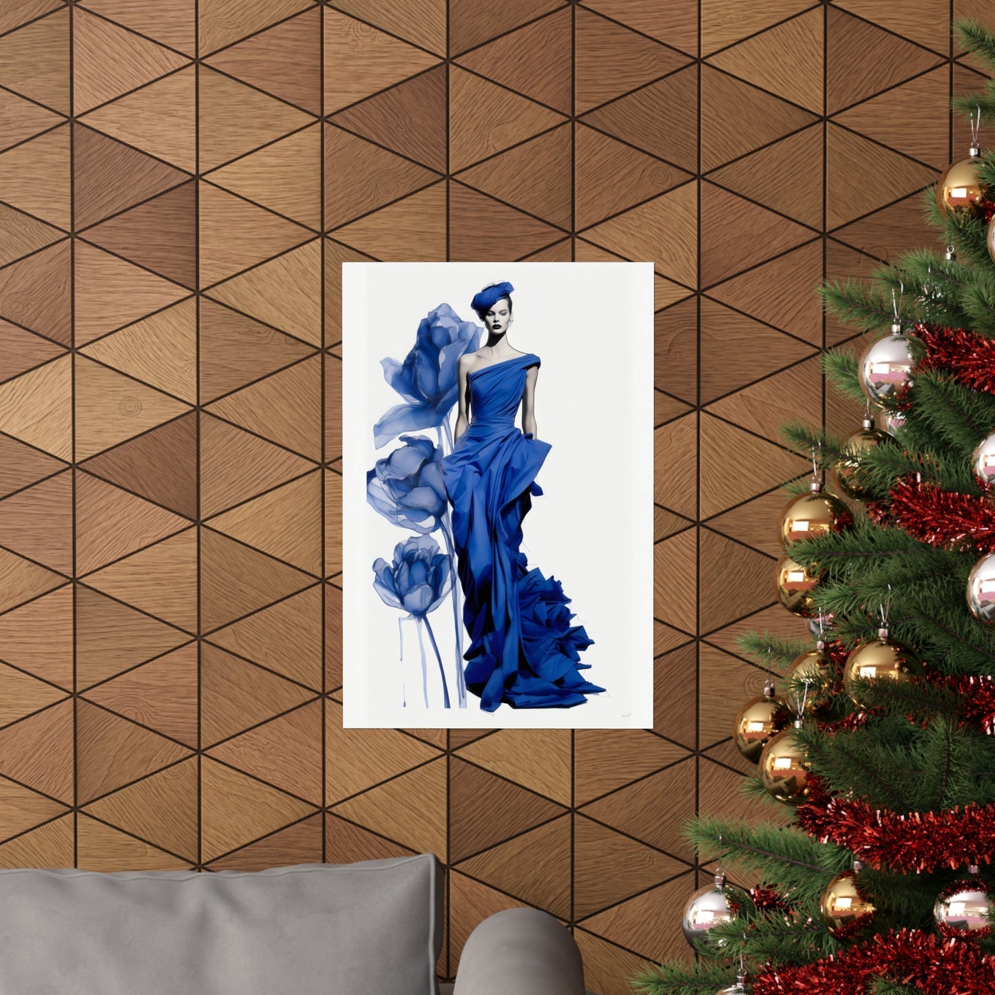 A christmas tree with a blue dress on it
