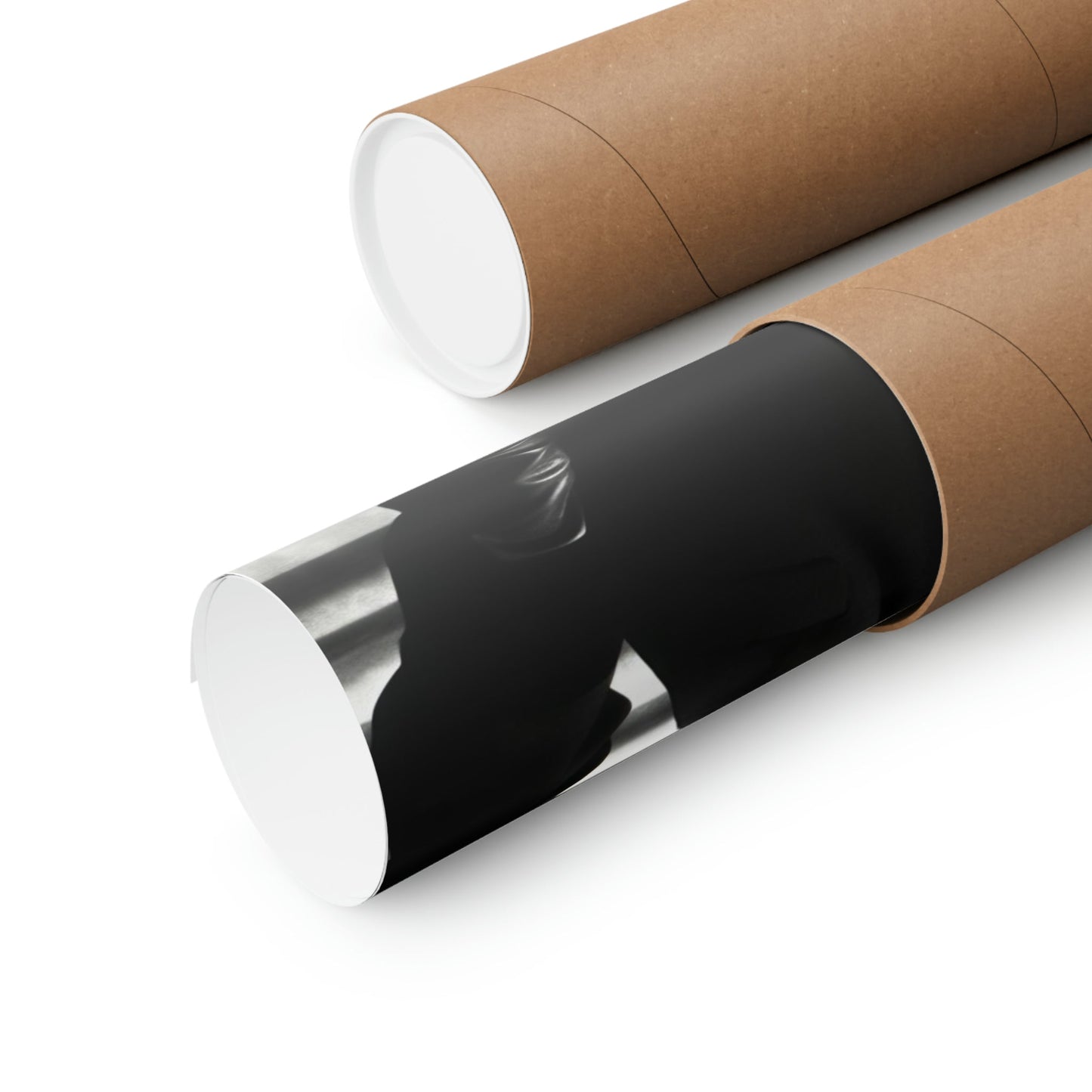 Two rolls of brown paper with black and white paper