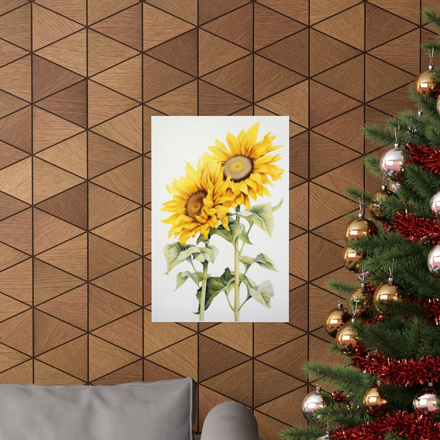 A sunflower on a wall with a christmas tree in the background