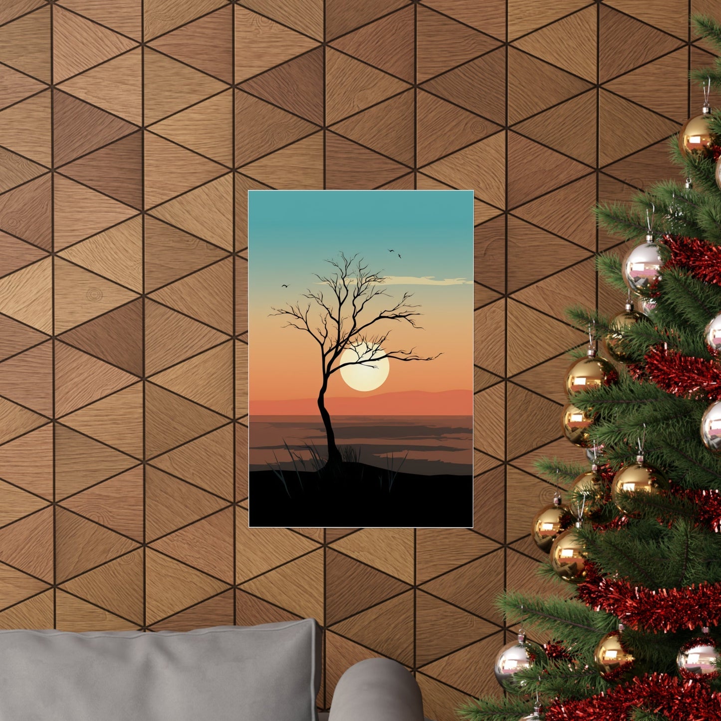 A christmas tree with a sunset in the background