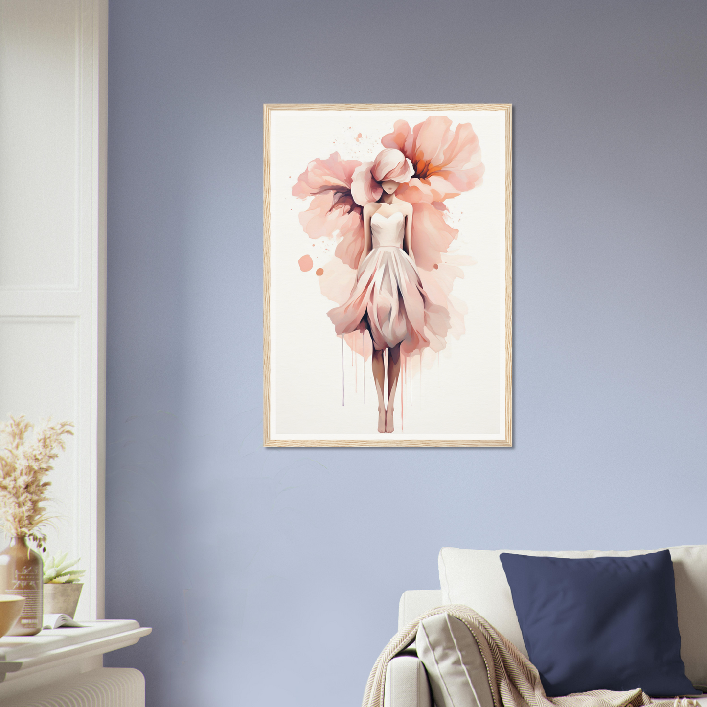 A living room with a couch and a painting on the wall