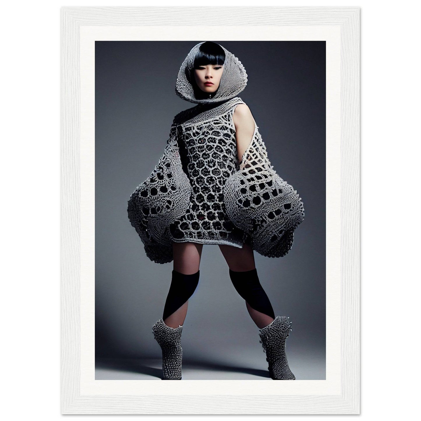 Avant-garde dress with honeycomb-patterned cutouts and exaggerated sculptural elements.
