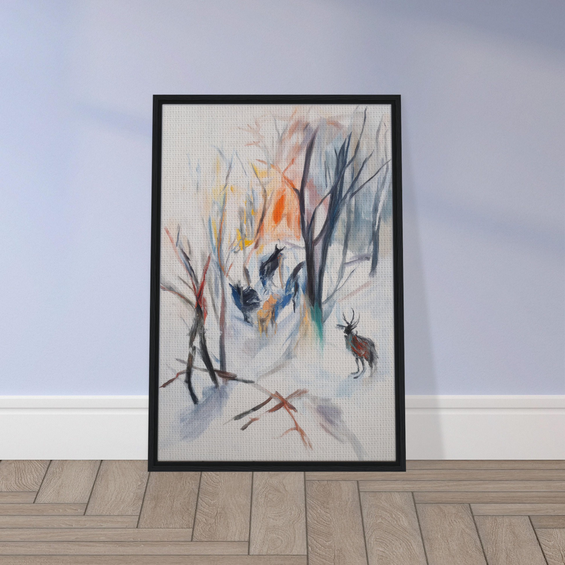 Framed canvas art featuring a winter forest scene and deer silhouette for room decor