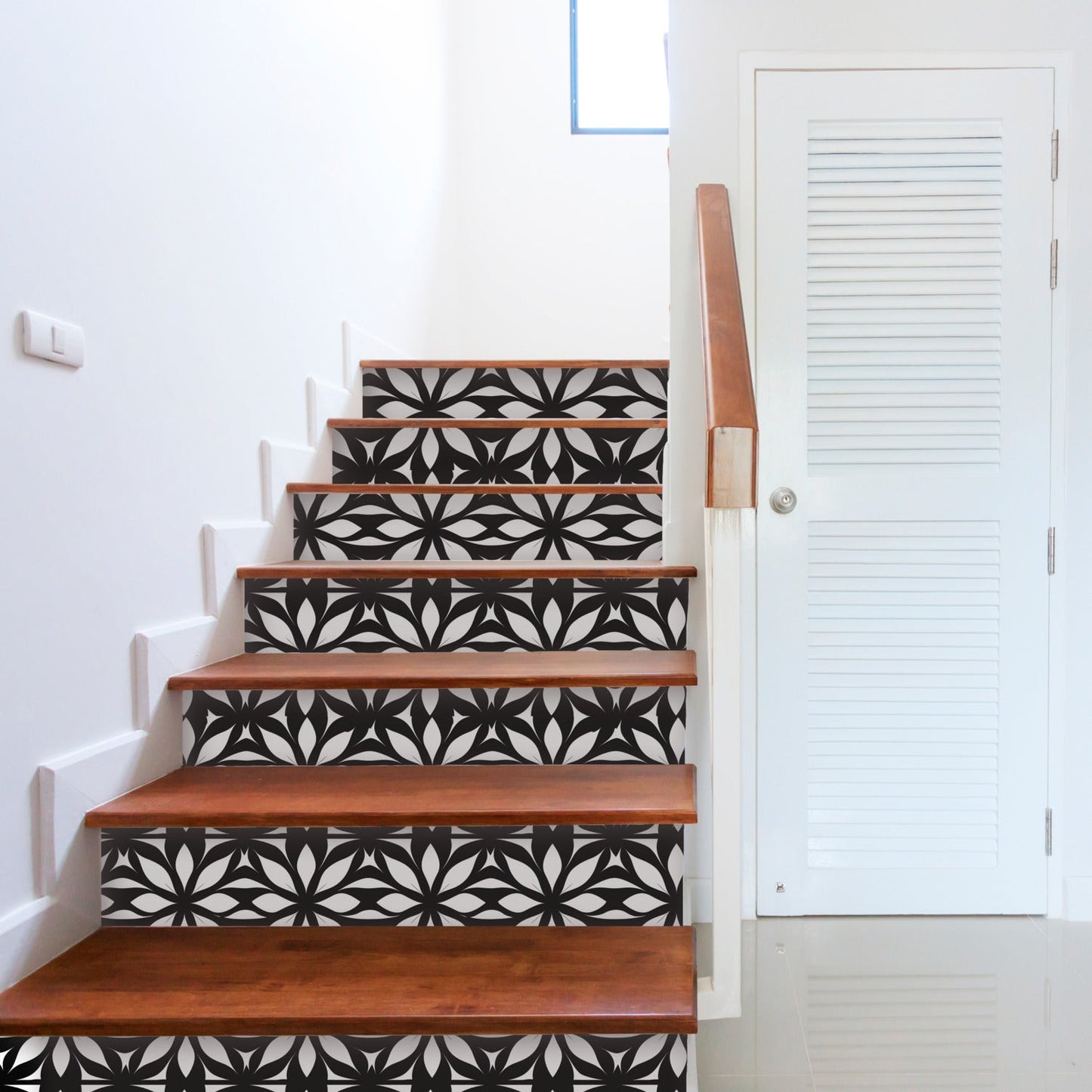 A stair with black and white geometric pattern