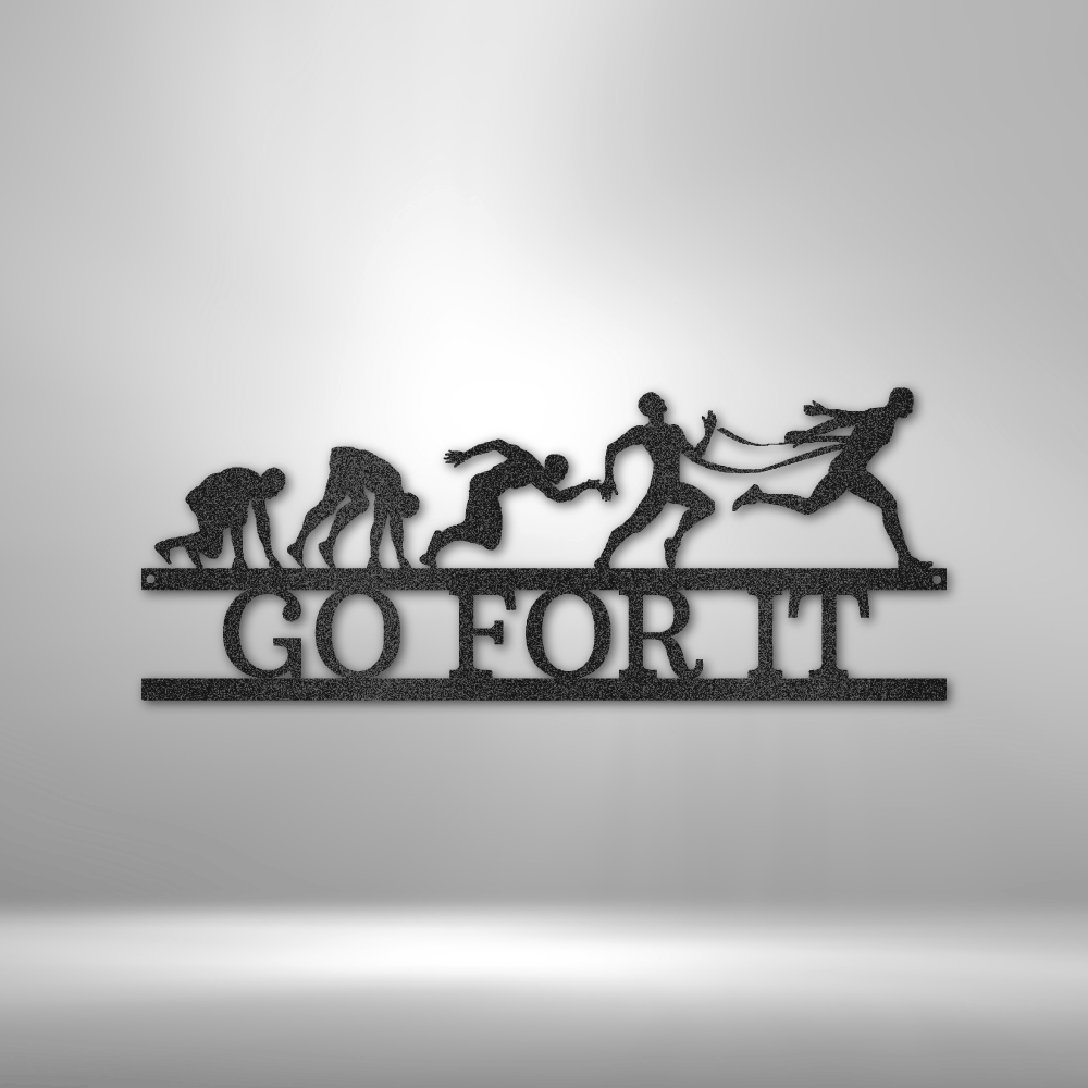 Metal wall art depicting the evolution of running with the text ’GO FOR IT’ underneath.