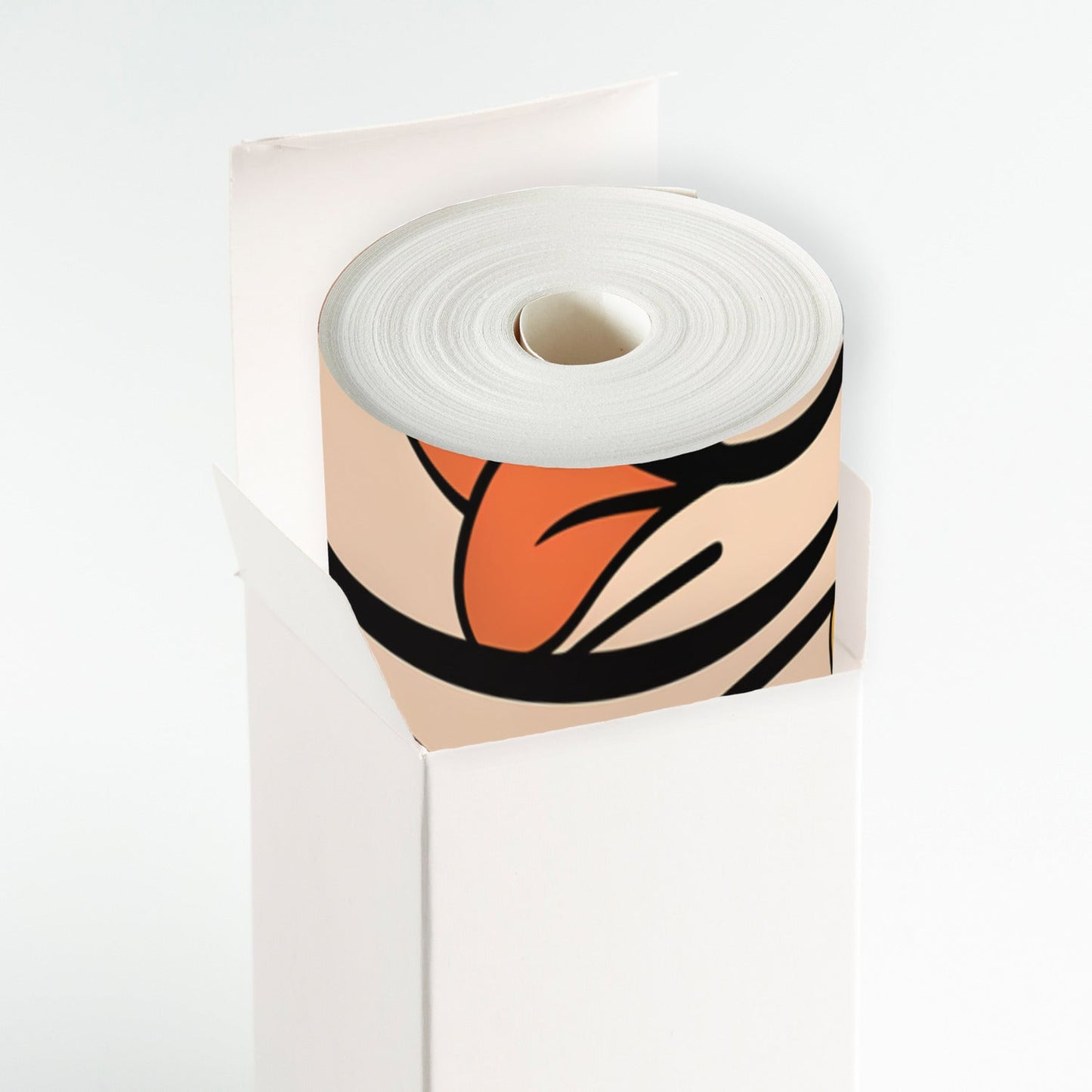 Roll of toilet paper with an abstract orange and black design on the wrapper.