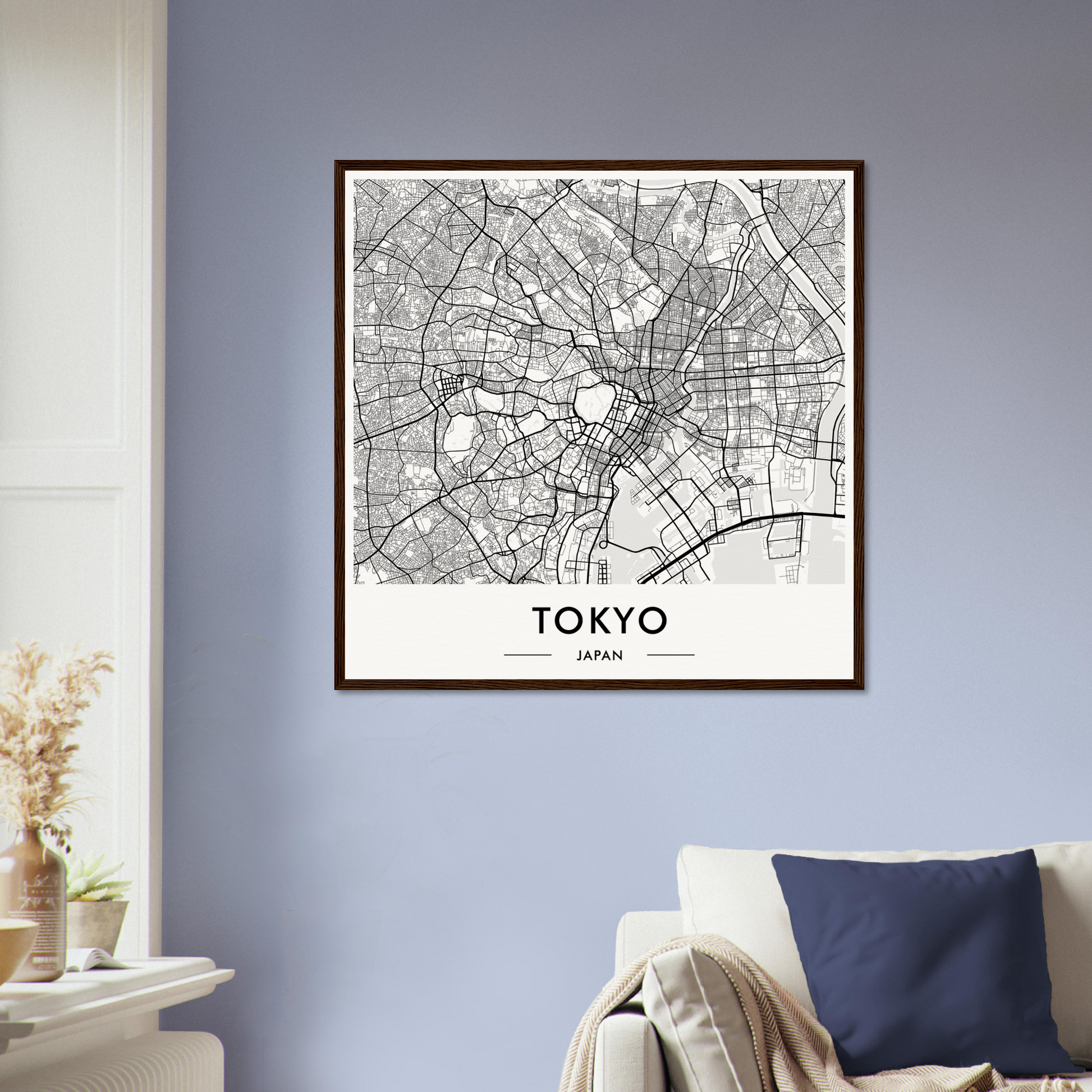 Framed map of Tokyo showing the city’s street layout and districts.