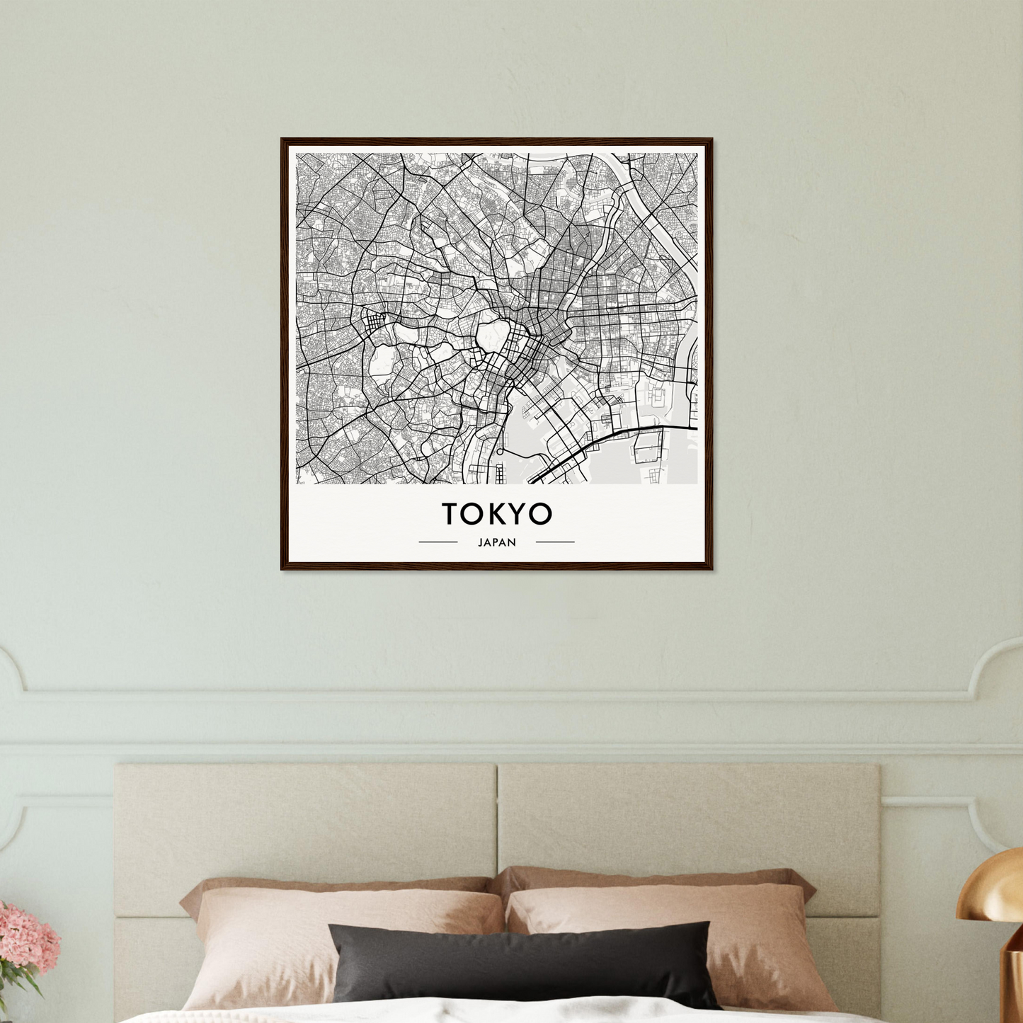 Framed map of Tokyo showing the city’s street layout and districts.