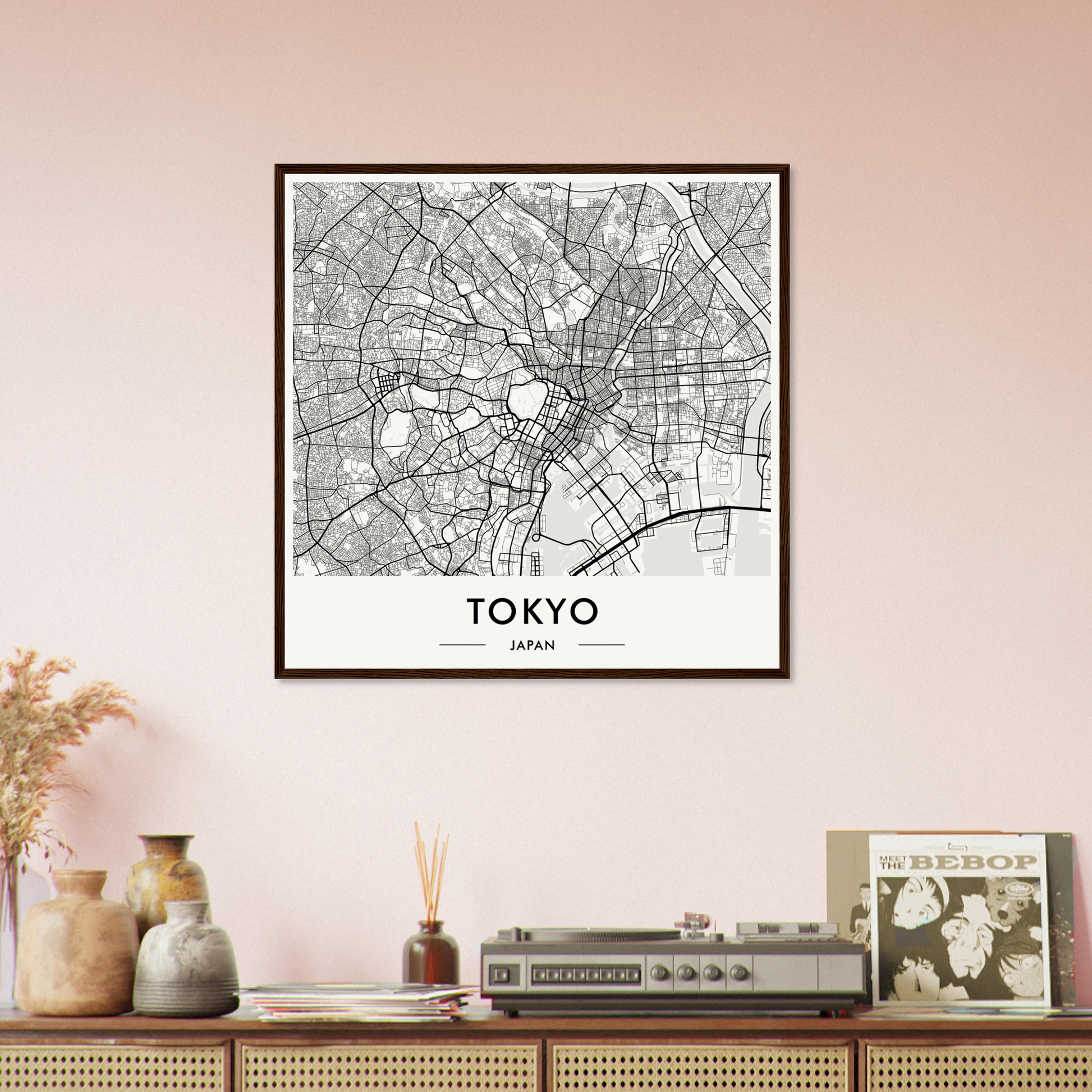 Framed map of Tokyo showing the city’s street layout and districts.