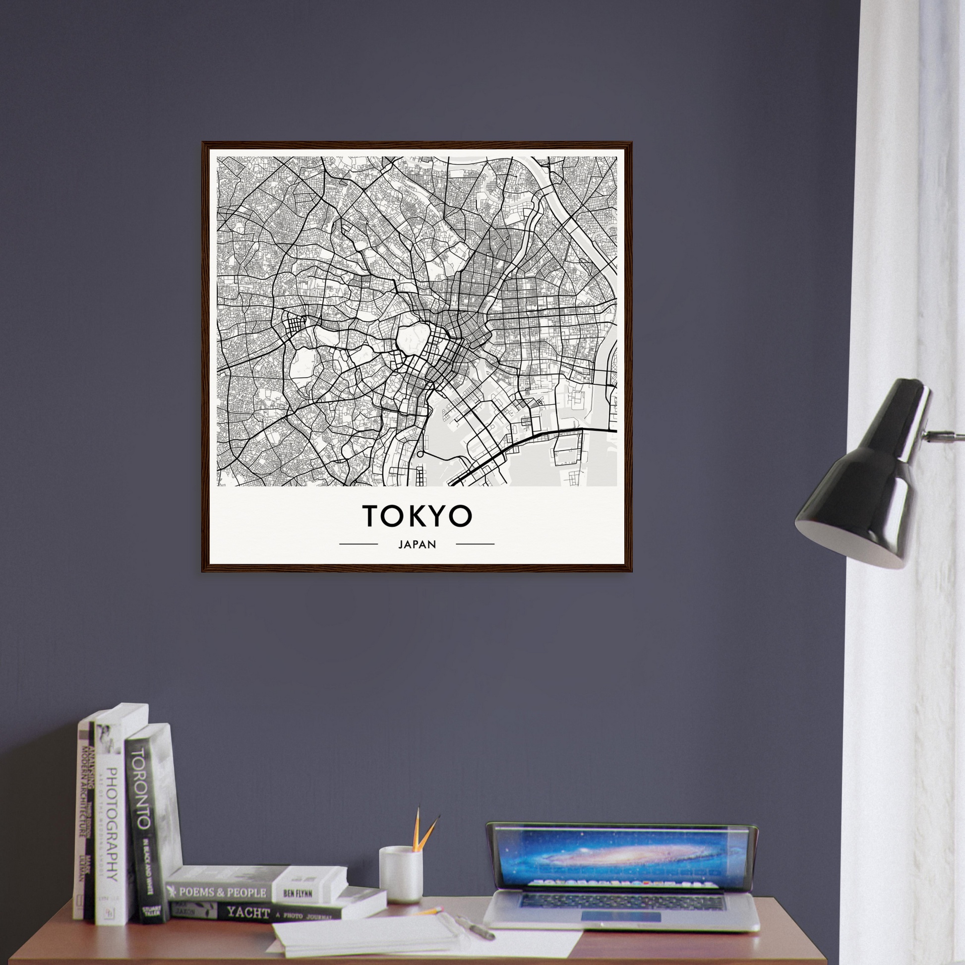 Framed map of Tokyo displayed on a wall.