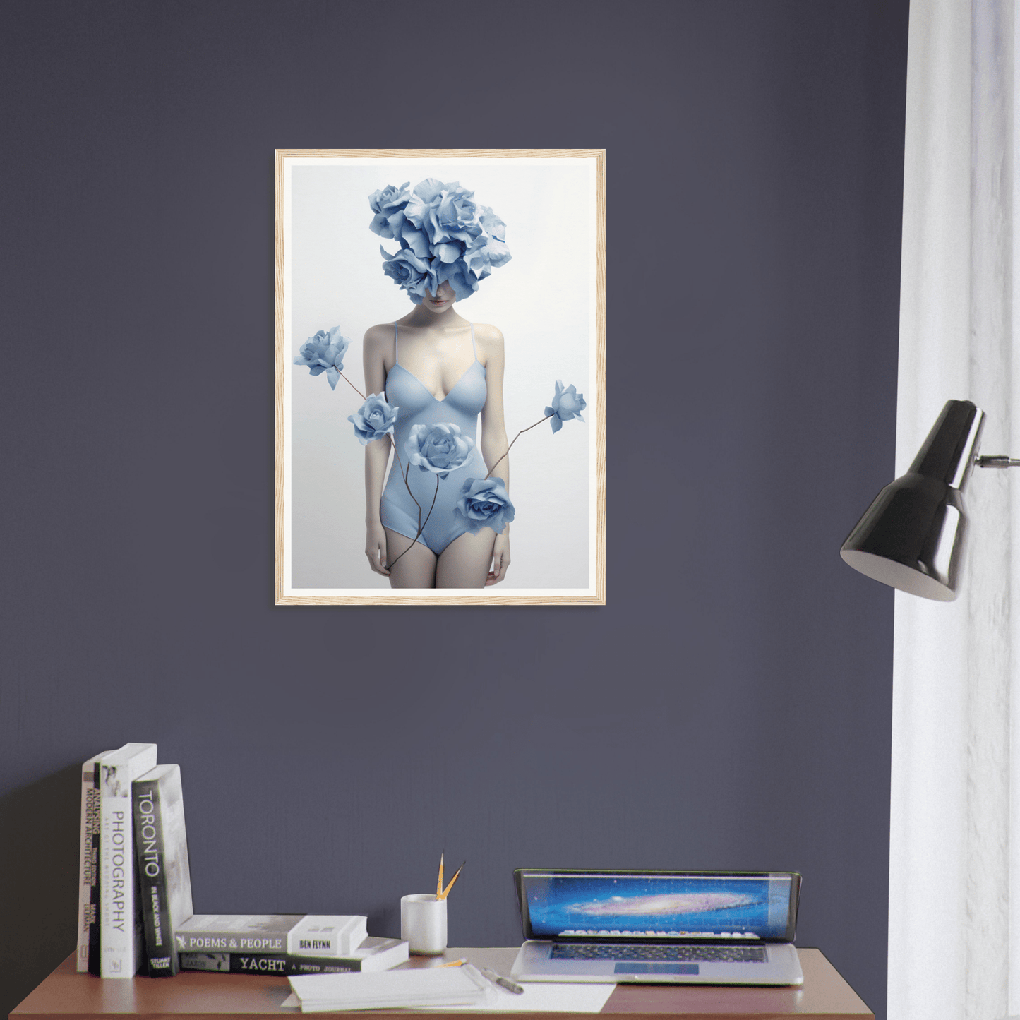 Framed artwork depicting a figure with blue floral elements replacing the head and adorning the body.