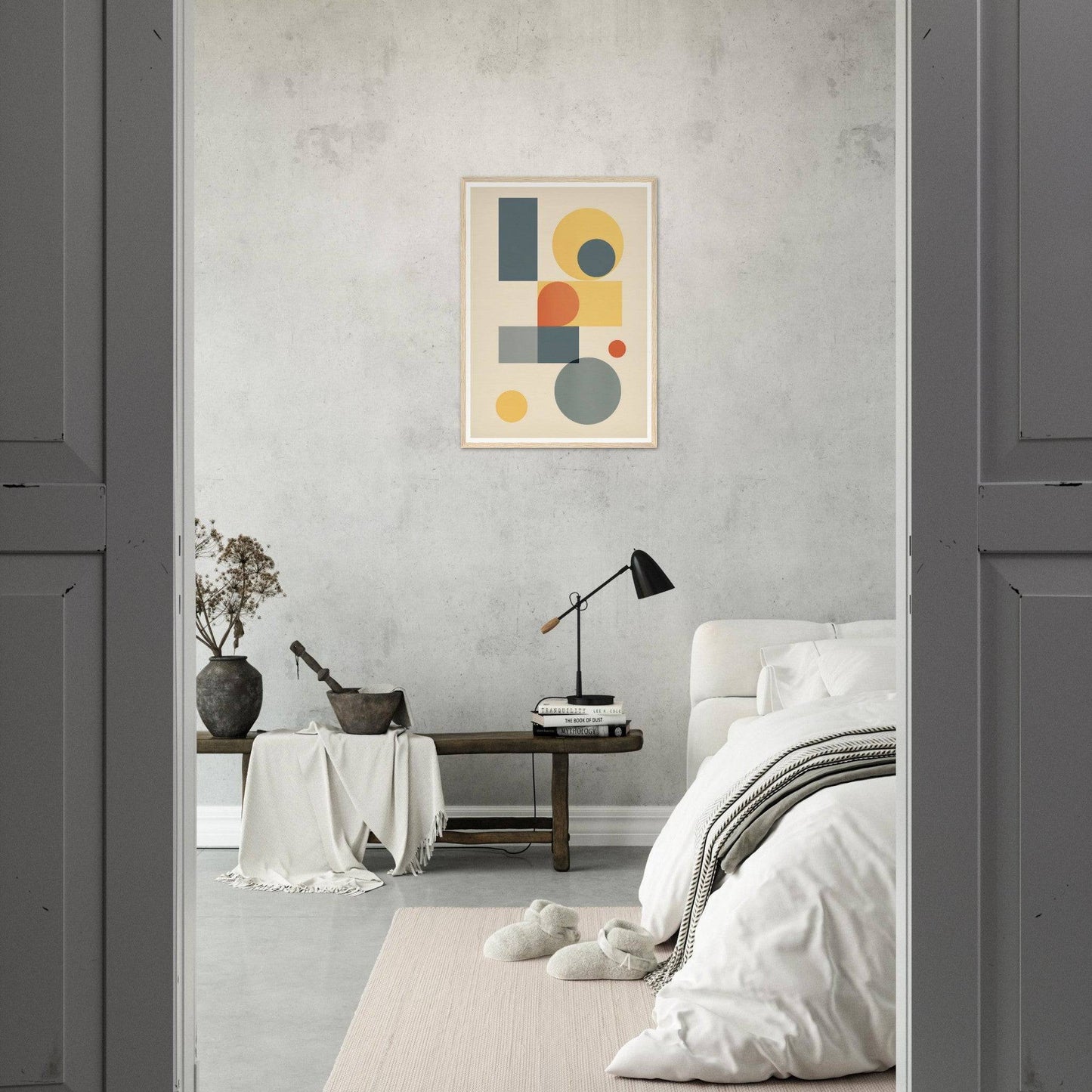 Minimalist bedroom with a geometric abstract artwork as the focal point.