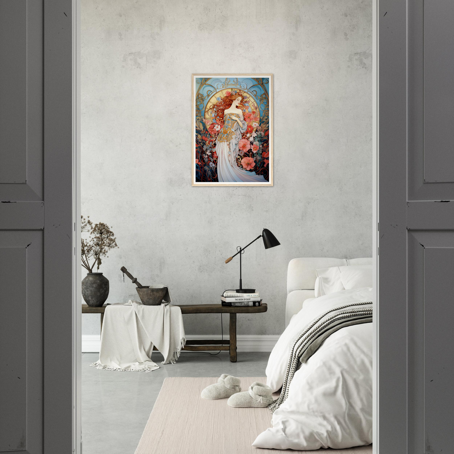 Framed Art Nouveau-style painting of a woman surrounded by flowers hanging on a white wall.
