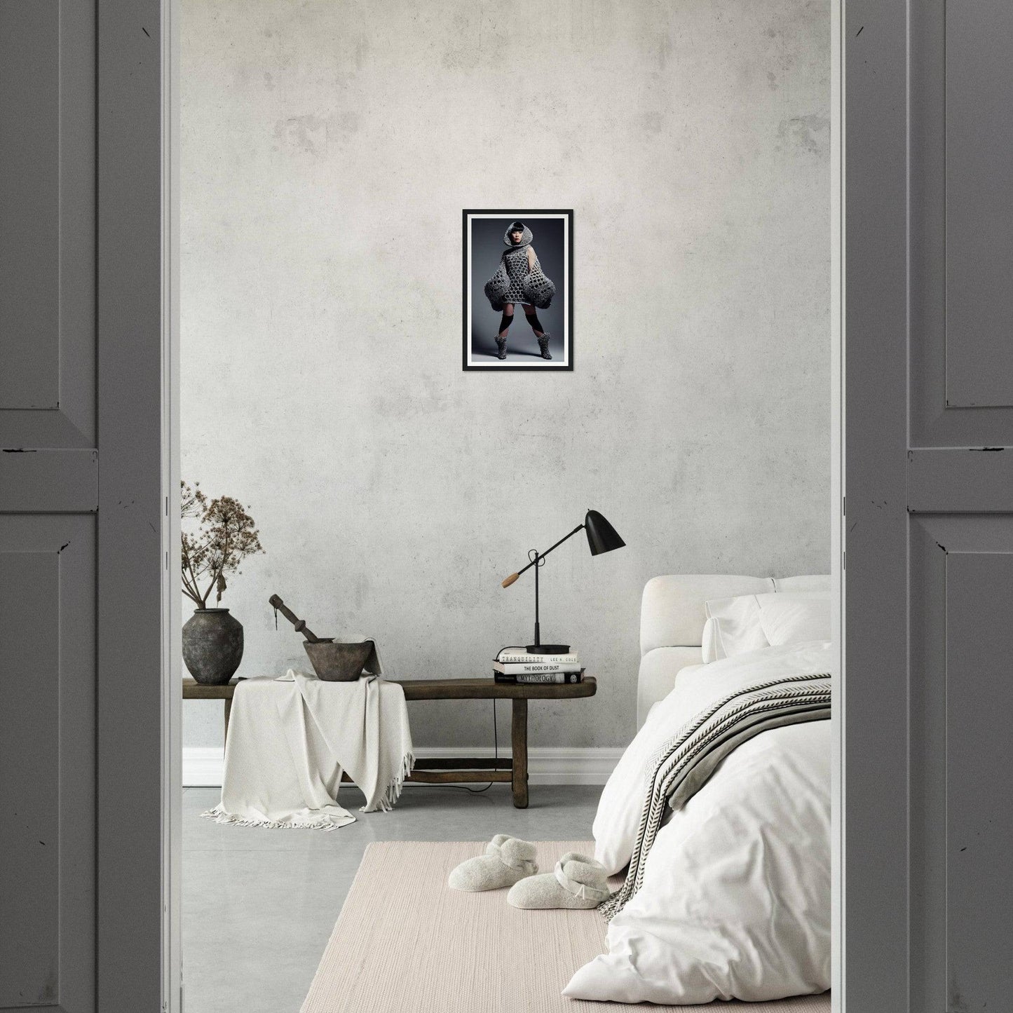 Minimalist bedroom with neutral color palette and simple decor.