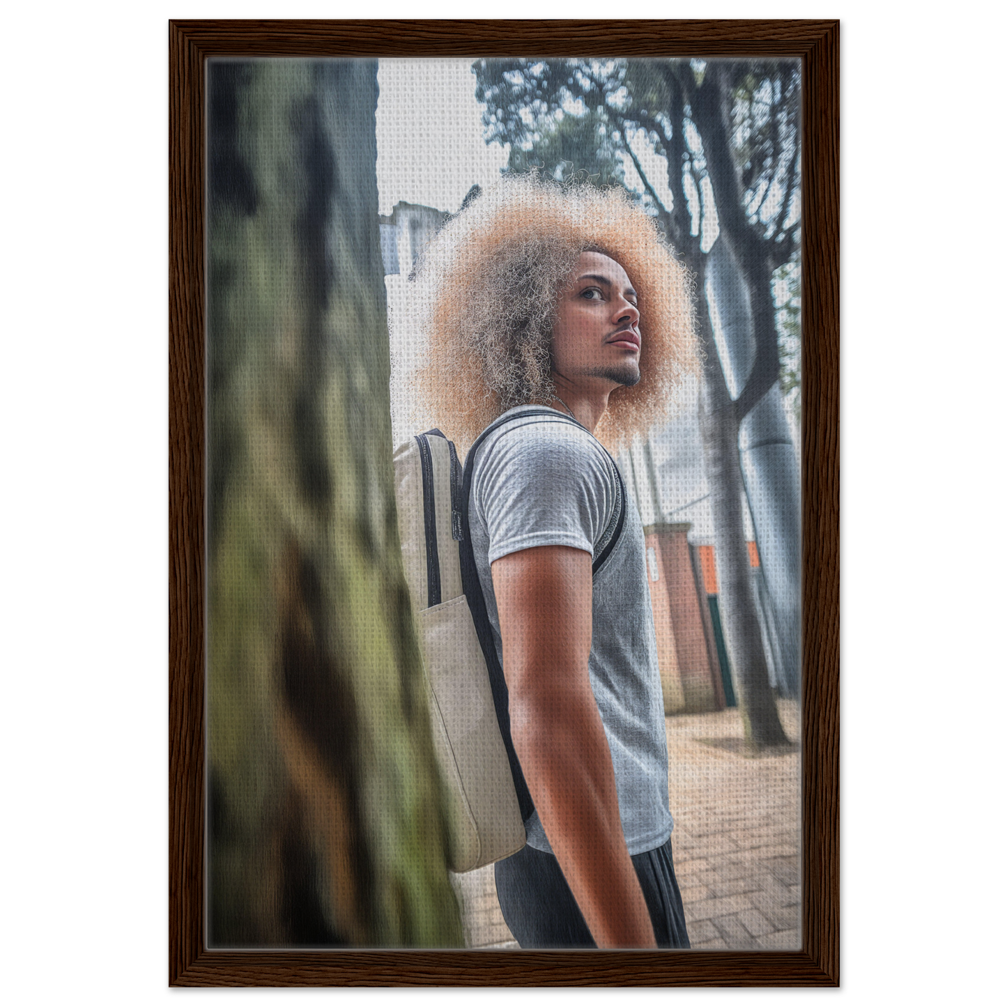 Person with voluminous curly blonde hair in gray t-shirt showcasing Urban Adventurous Gaze