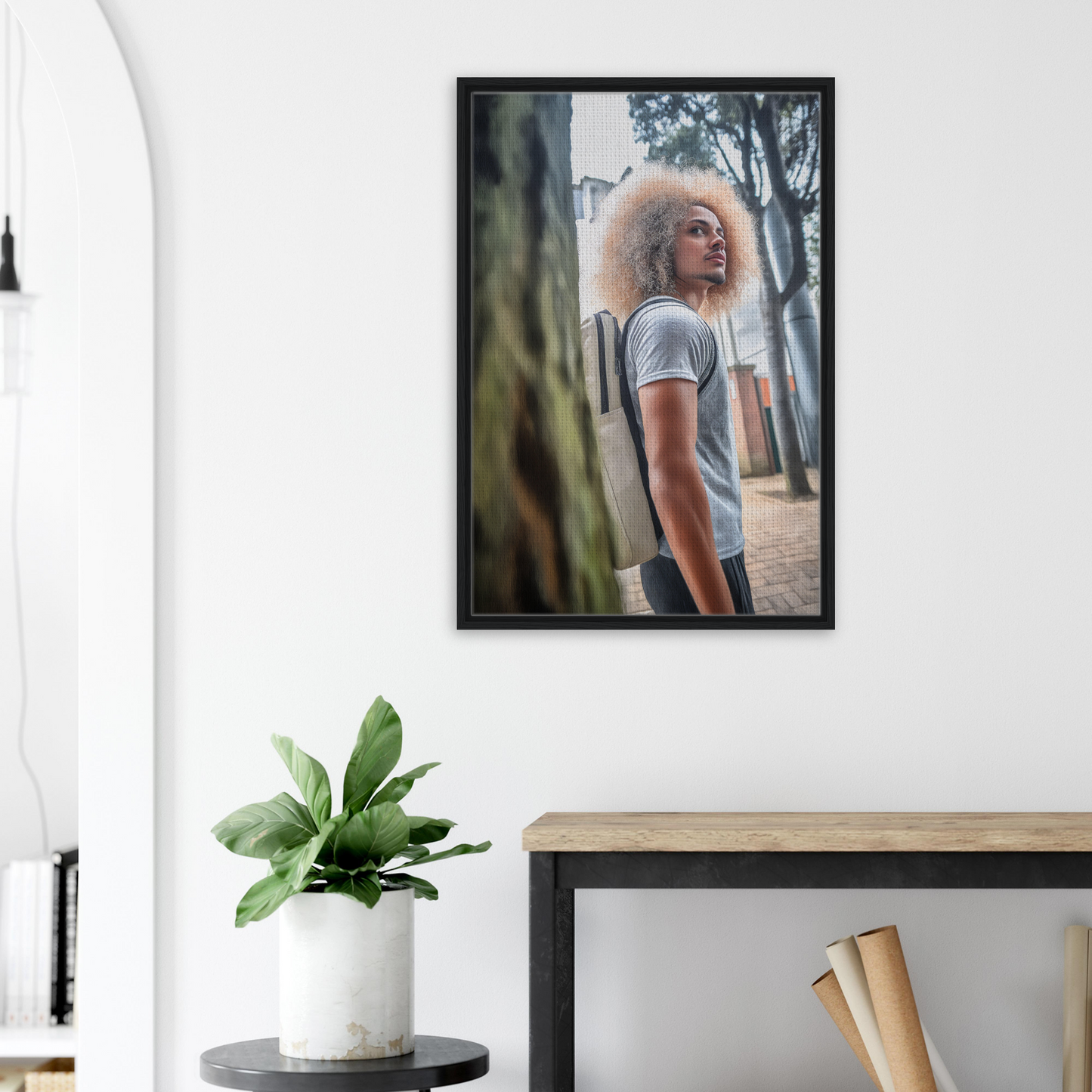 Framed portrait of a person with voluminous blonde curls showcasing an urban adventurous gaze