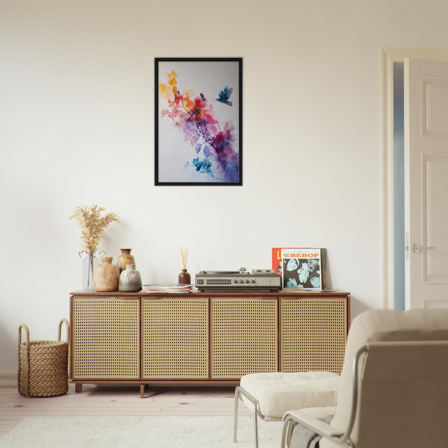 Wooden sideboard with rattan doors displaying Violet Flight Poems and decorative items