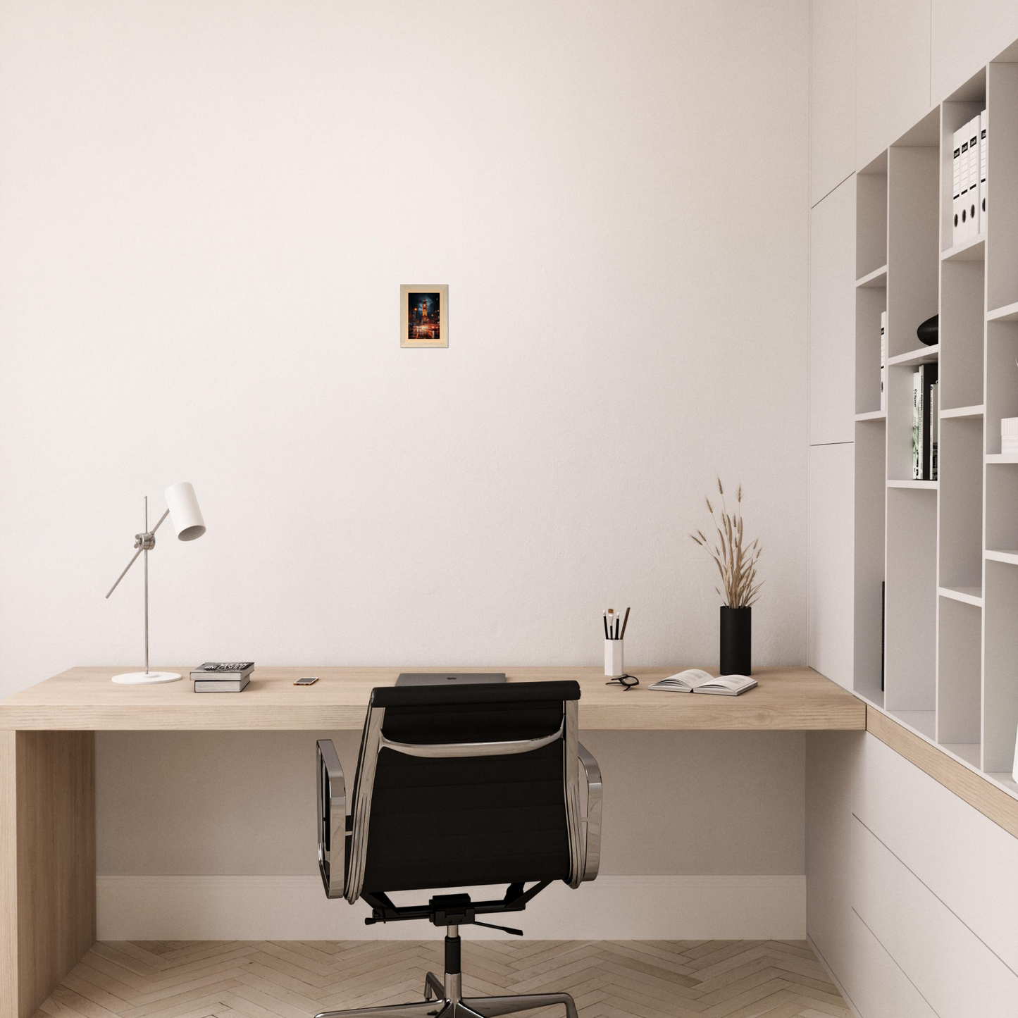 Minimalist wooden desk with a black office chair in a clean, white workspace.