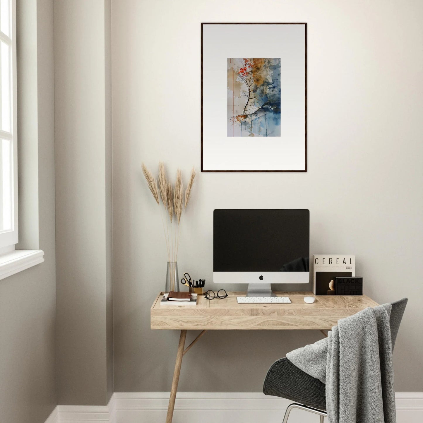Minimalist wooden desk with computer, wall art, and decorative elements for room decoration