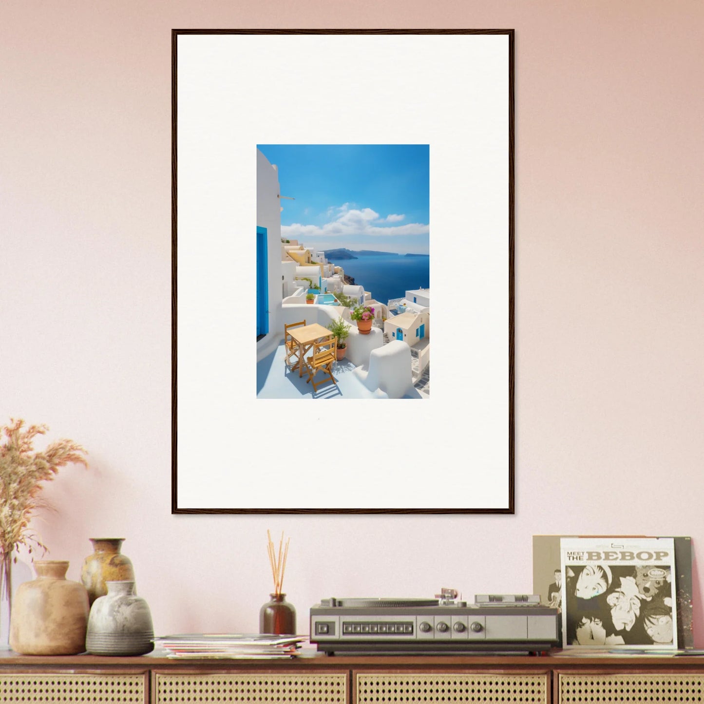 Framed poster of Santorini’s white buildings and blue sea in Dream-Touched Odyssey
