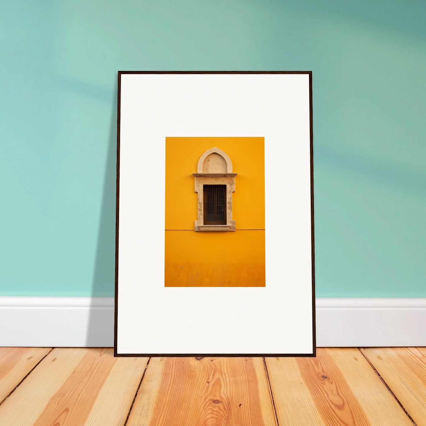 Framed wall art of an ornate window on a yellow wall, perfect for the Golden Correspondence Portal