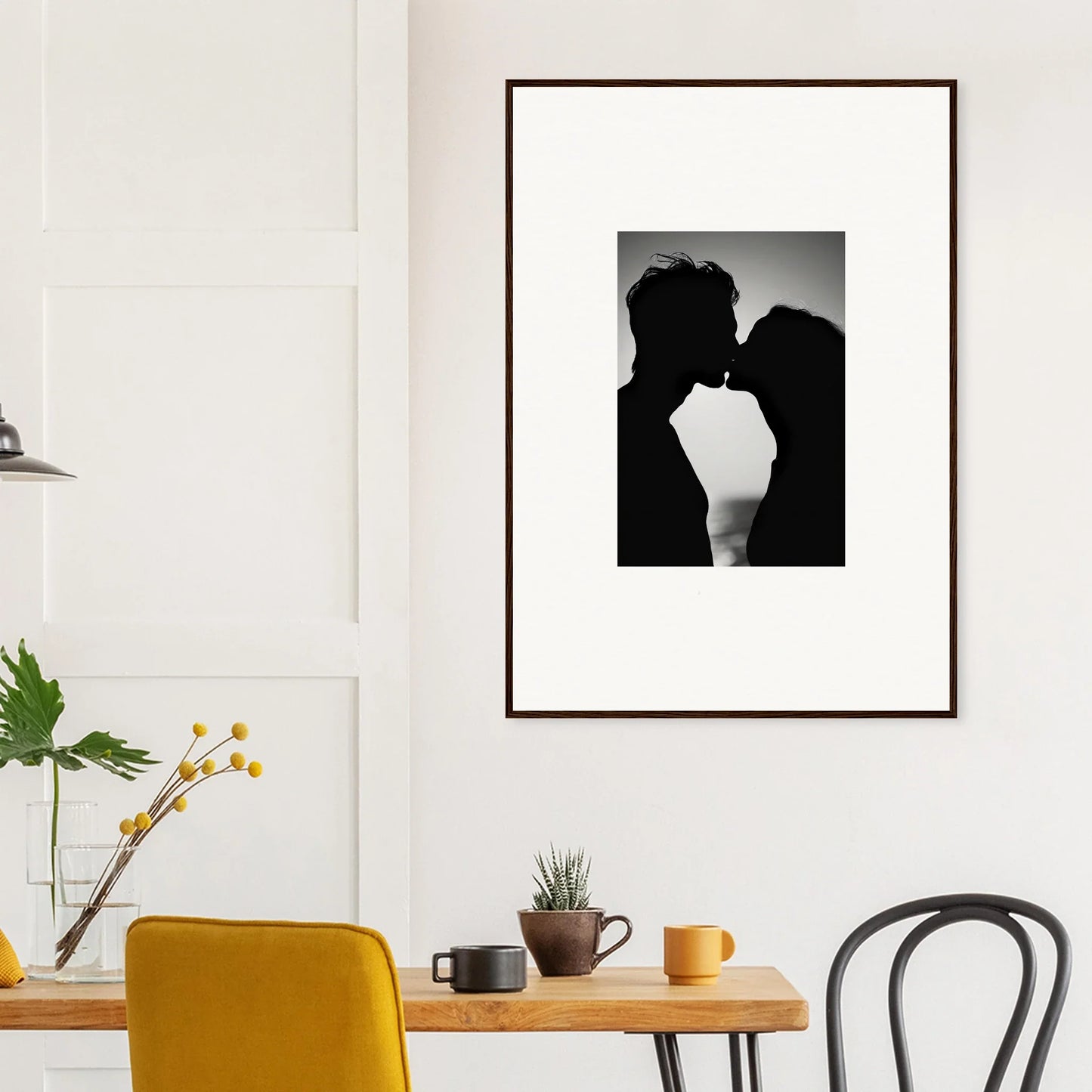 Framed black and white silhouette of a couple kissing, part of Sunset Soul Sierması