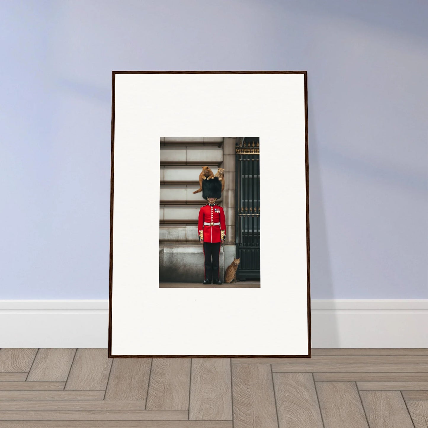 Framed poster of a Queen’s Guard in red uniform at Sensational Sentinels’ Playground
