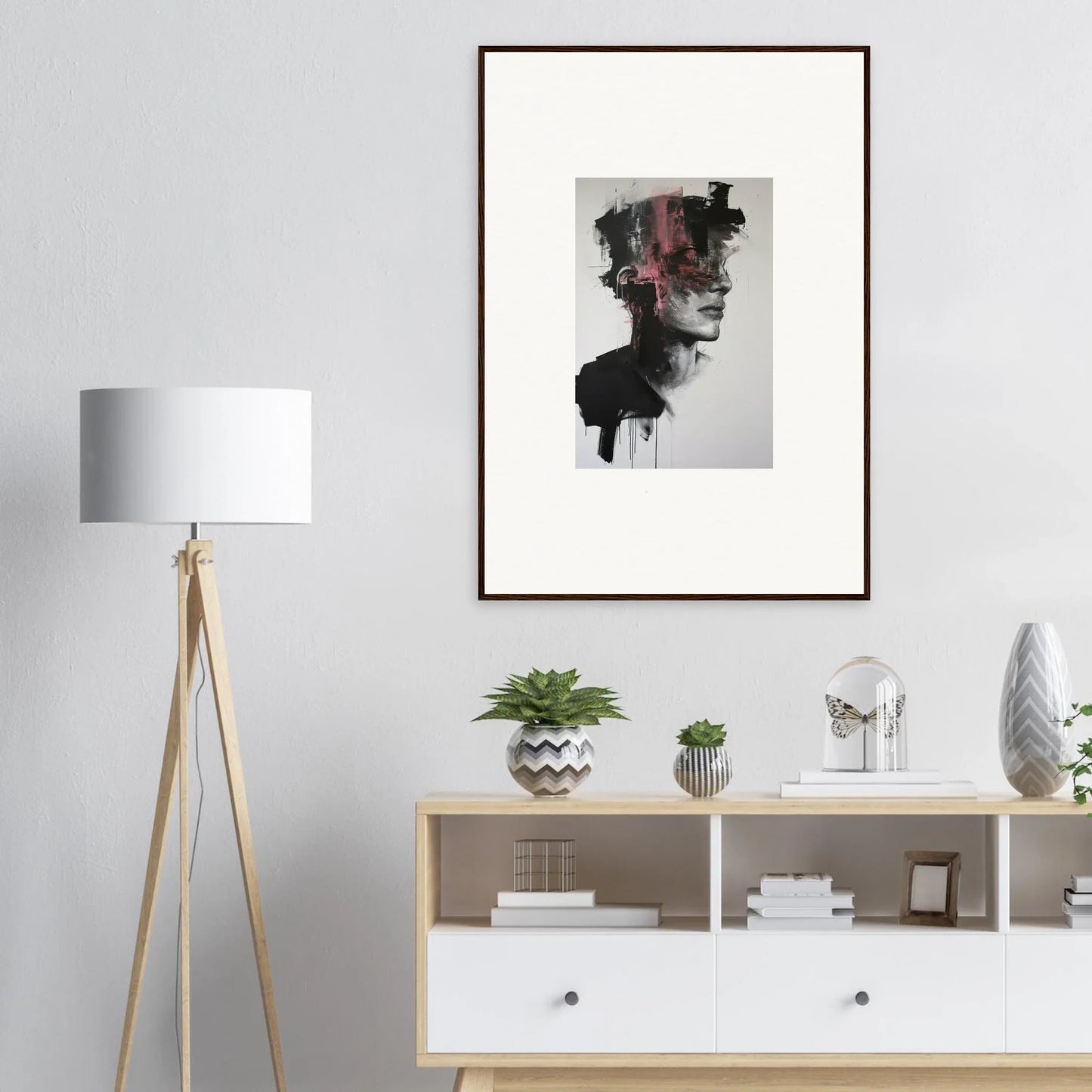Abstract portrait with dark brushstrokes and pink splashes on Fragmented Psyche Canvas