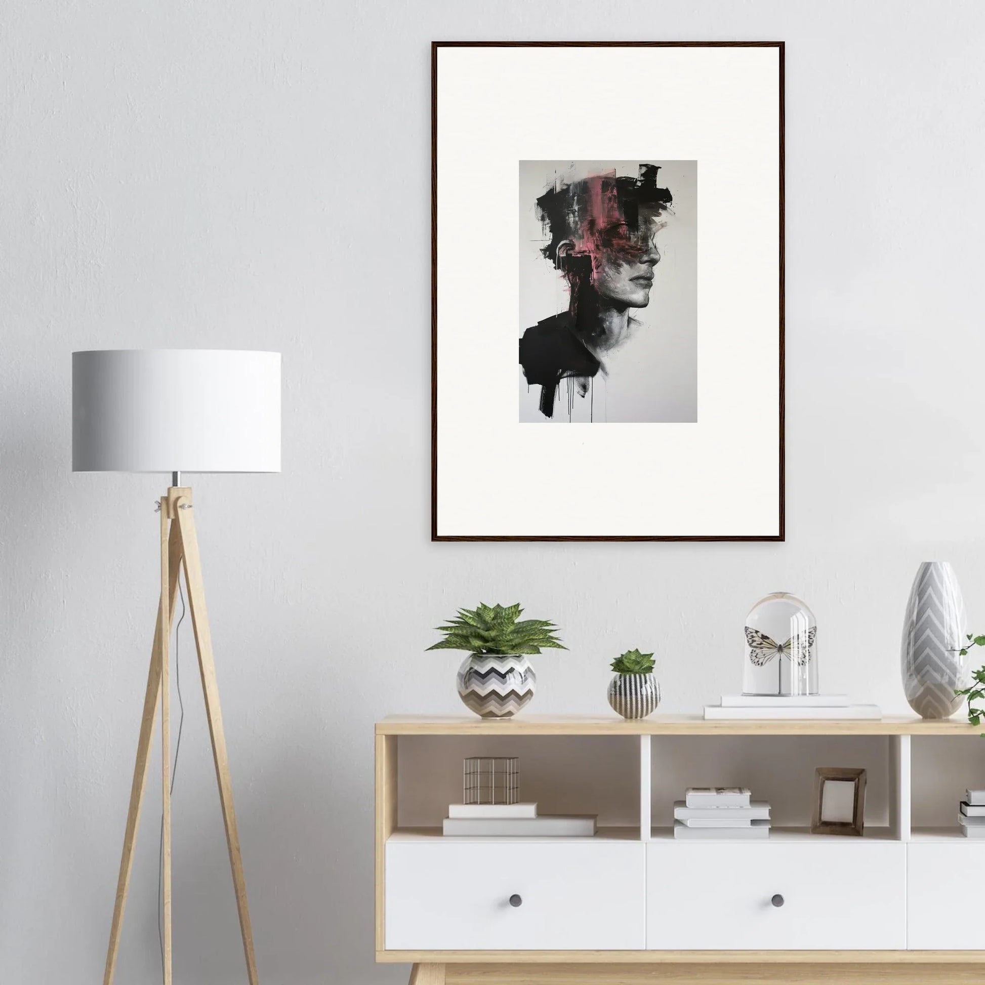 Abstract portrait with dark brushstrokes and pink splashes on Fragmented Psyche Canvas