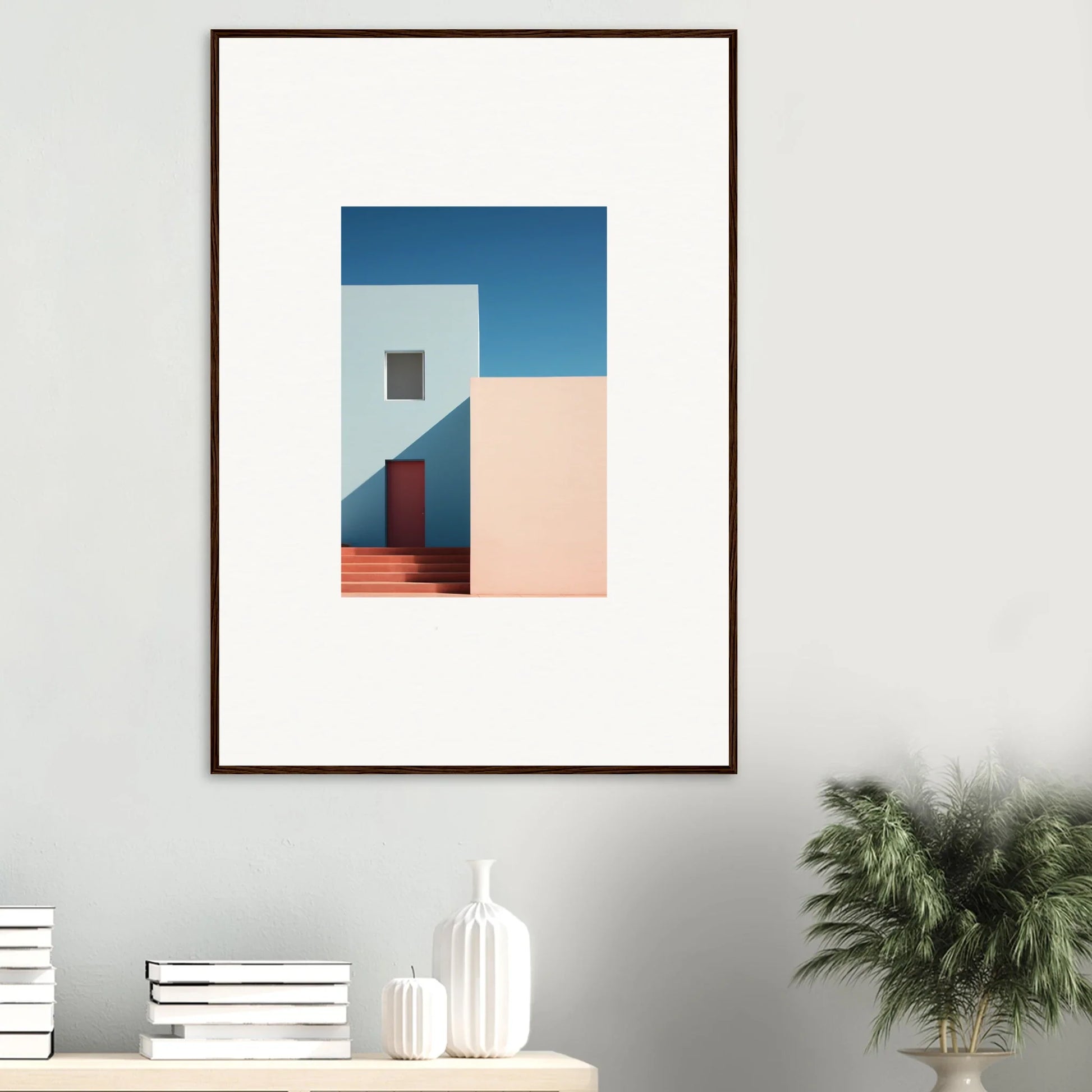 Framed minimalist photograph of a white building with red door for premium framed wall art