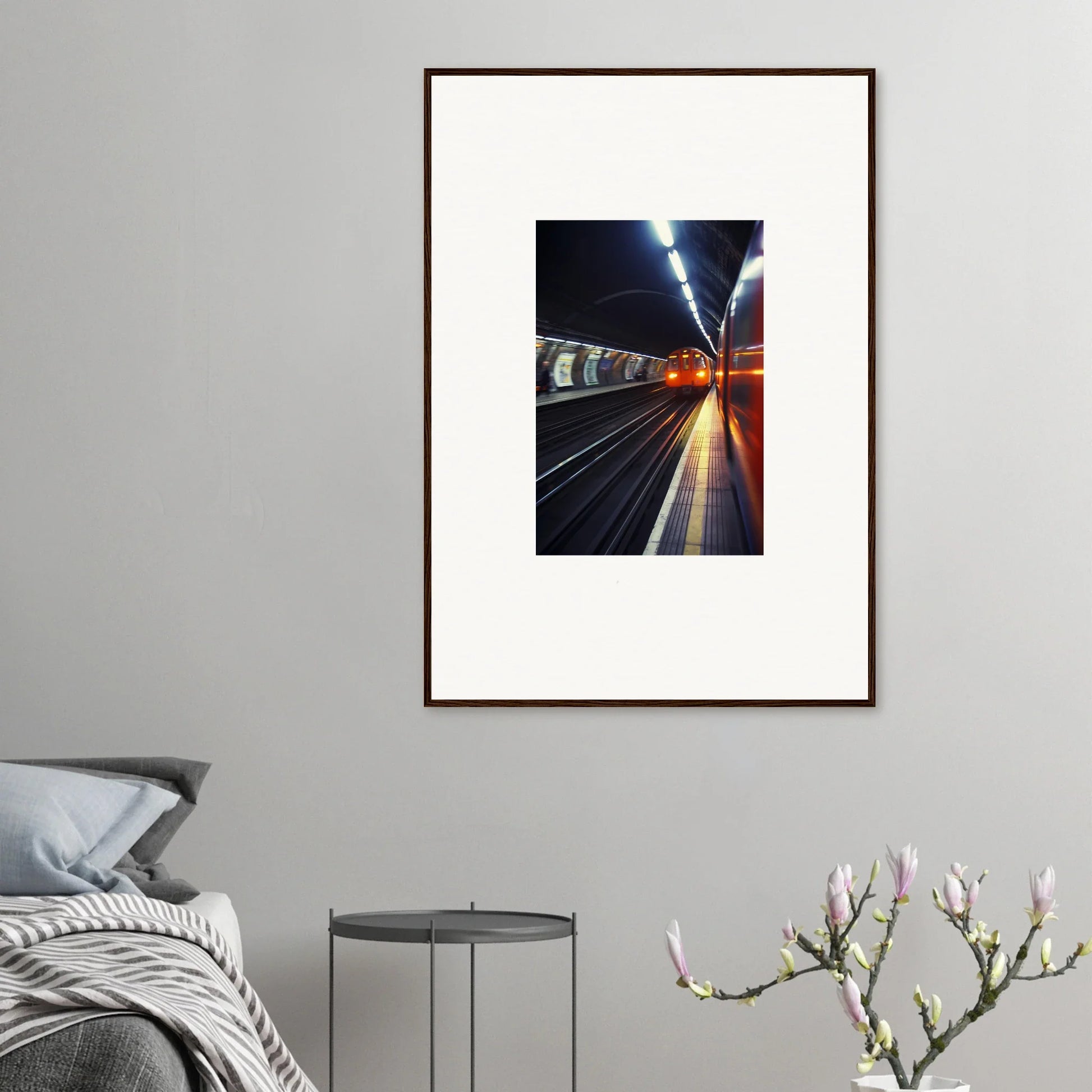 Framed photo of an illuminated subway tunnel platform from Threads Passagesquent Hues