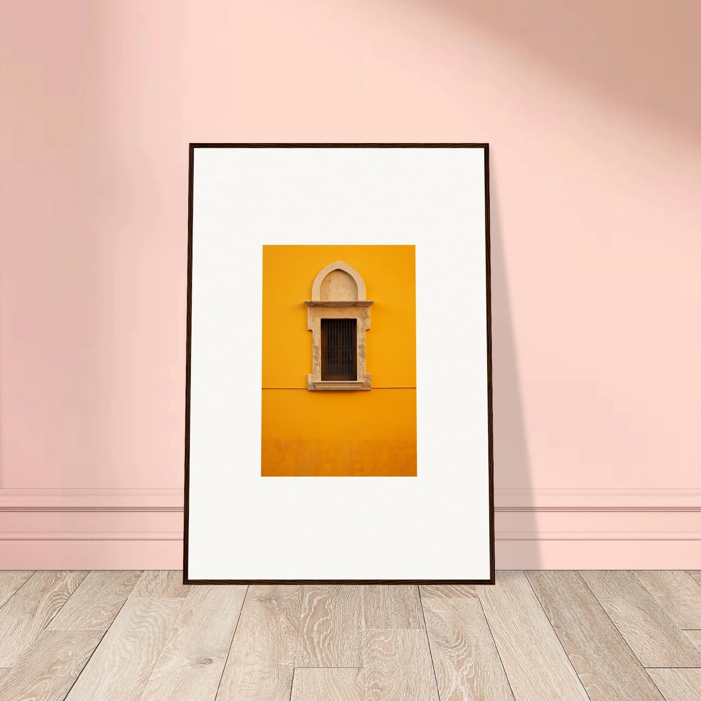 Framed wall art of a window on a yellow wall in the Golden Correspondence Portal design