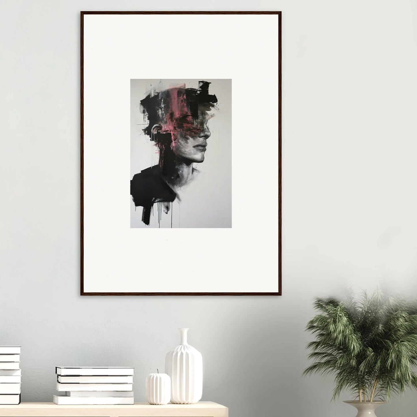 Framed abstract portrait of Fragmented Psyche Canvas with dark smudges and pink streak
