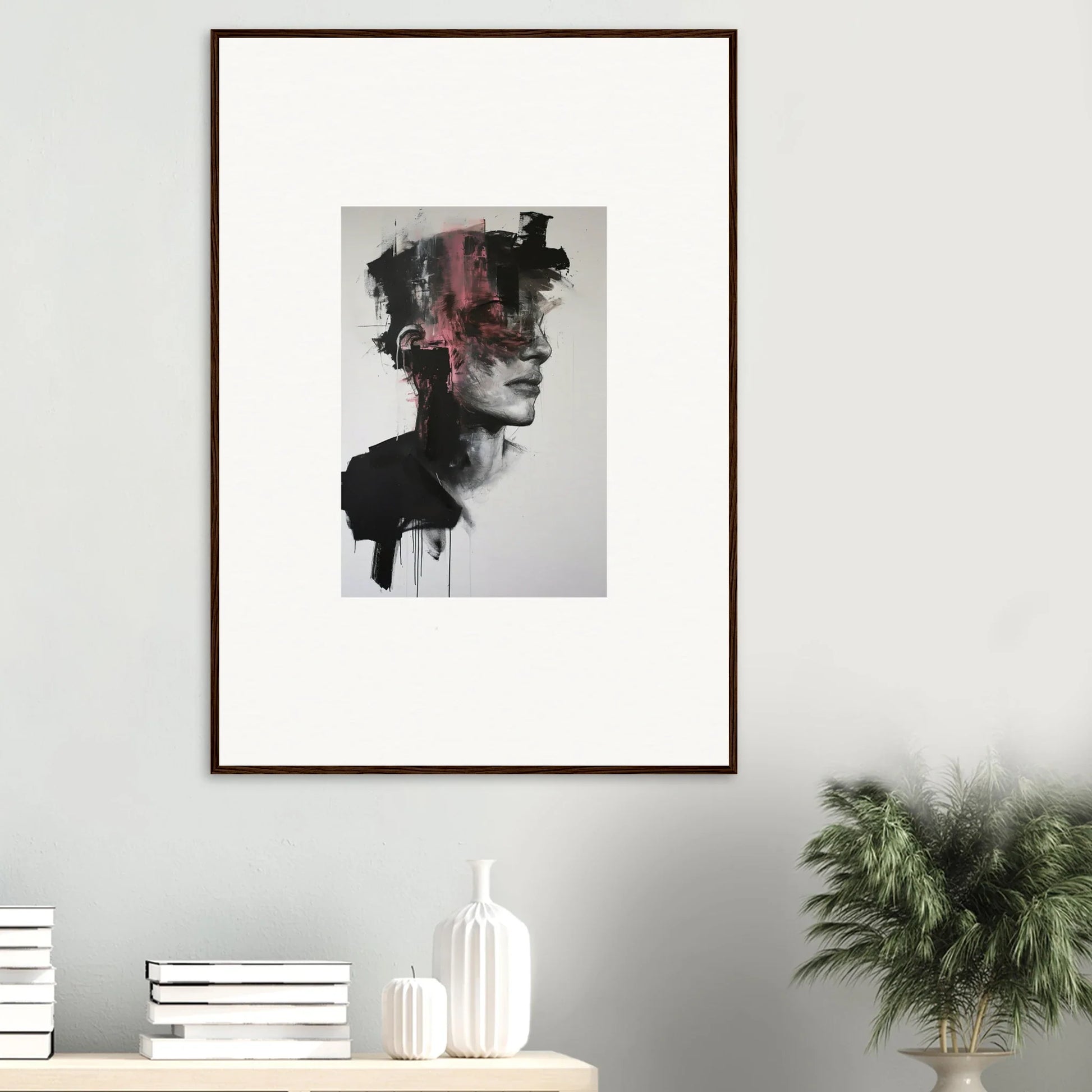 Framed abstract portrait of Fragmented Psyche Canvas with dark smudges and pink streak