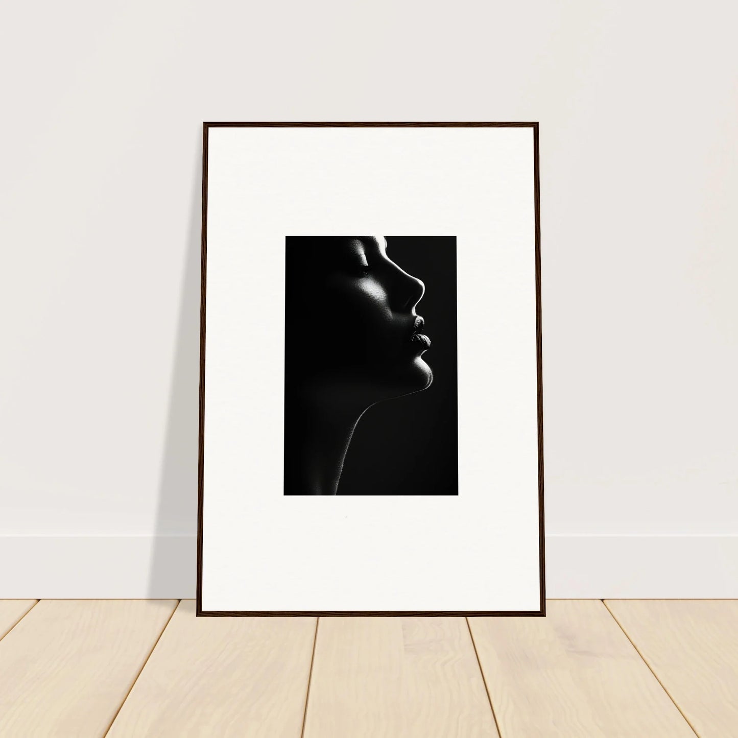 Framed black and white profile portrait with dramatic shadows from Yin Space Reverie