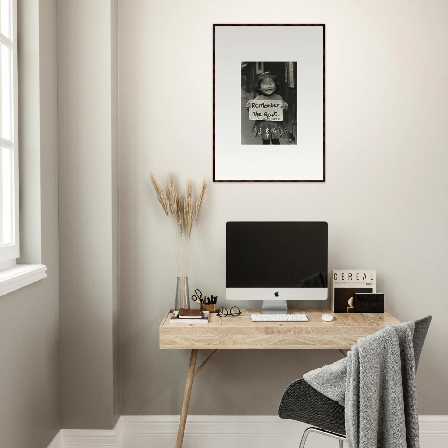 Minimalist wooden desk with iMac and decor showcasing Sacred Smile Echoes art style