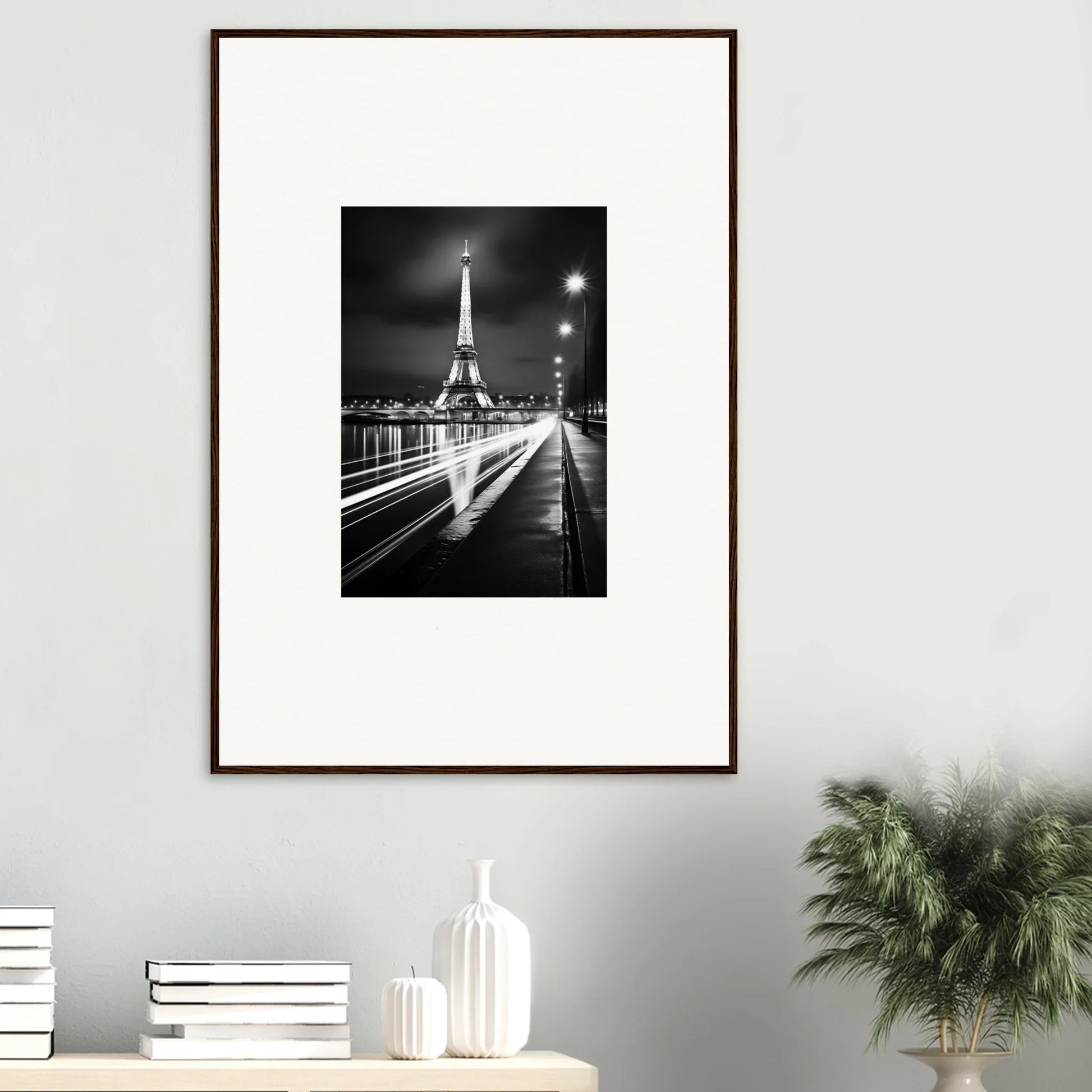 Framed black and white photograph of the Eiffel Tower at night for Ghosts of Luminosity