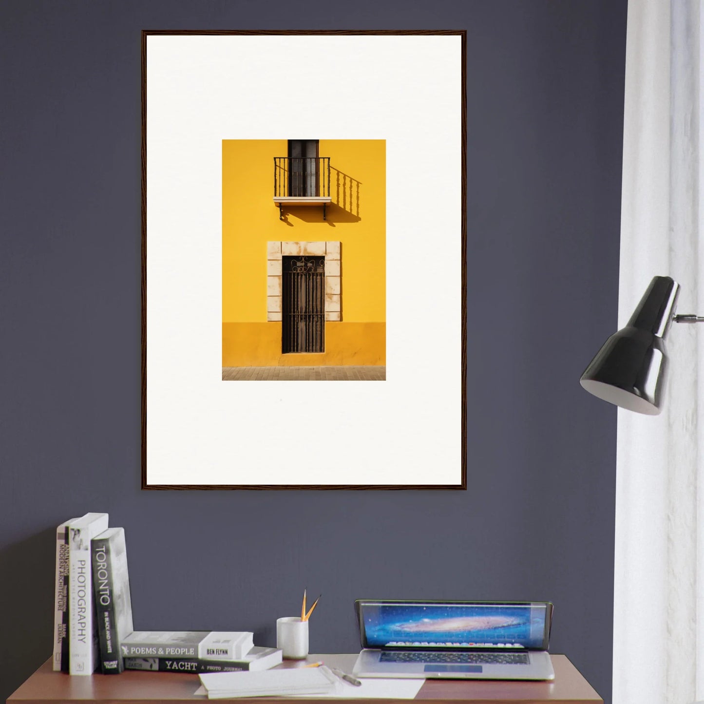 Framed art of a yellow building with a black door for Sun Custard Symphonies