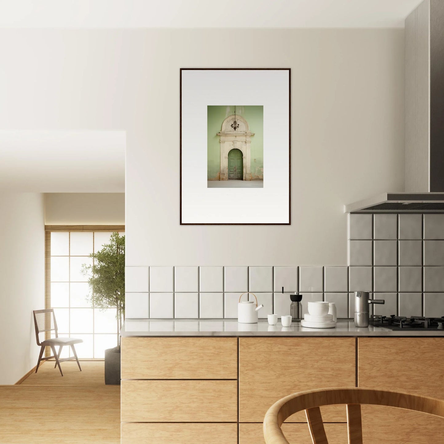 Modern kitchen featuring Thresholds Quiet Whisper with light wood cabinets and white tiles