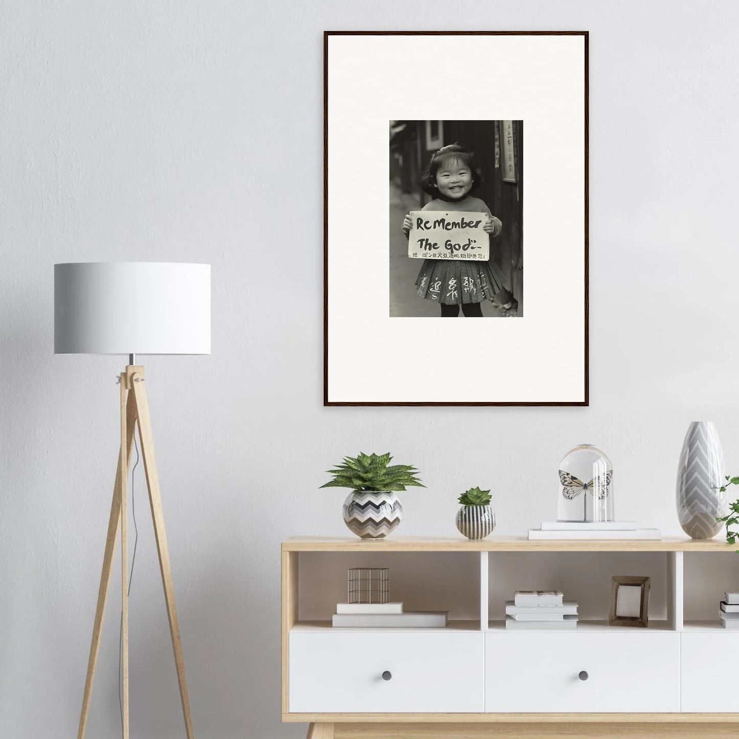 Black and white framed wall art on light gray wall from Sacred Smile Echoes special edition art™