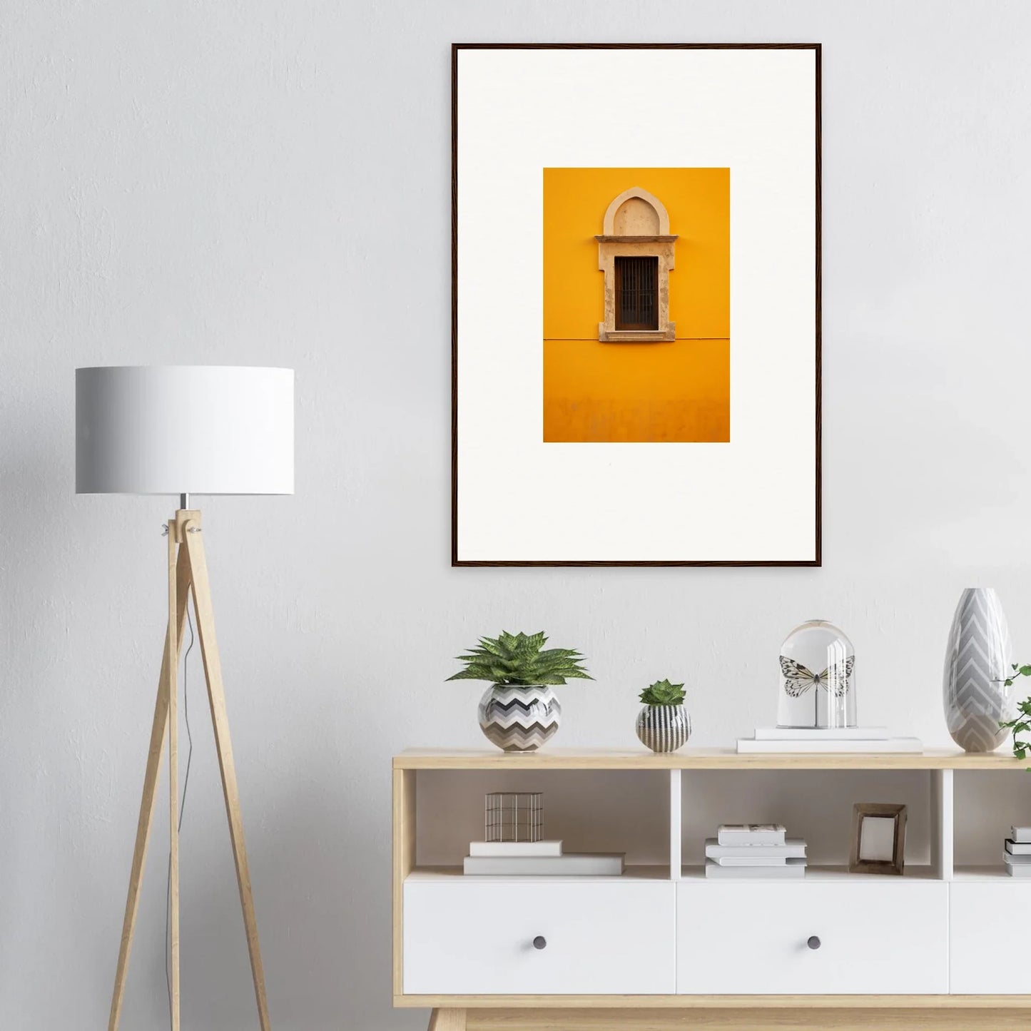 Framed wall art featuring a yellow wall and arched window from Golden Correspondence Portal