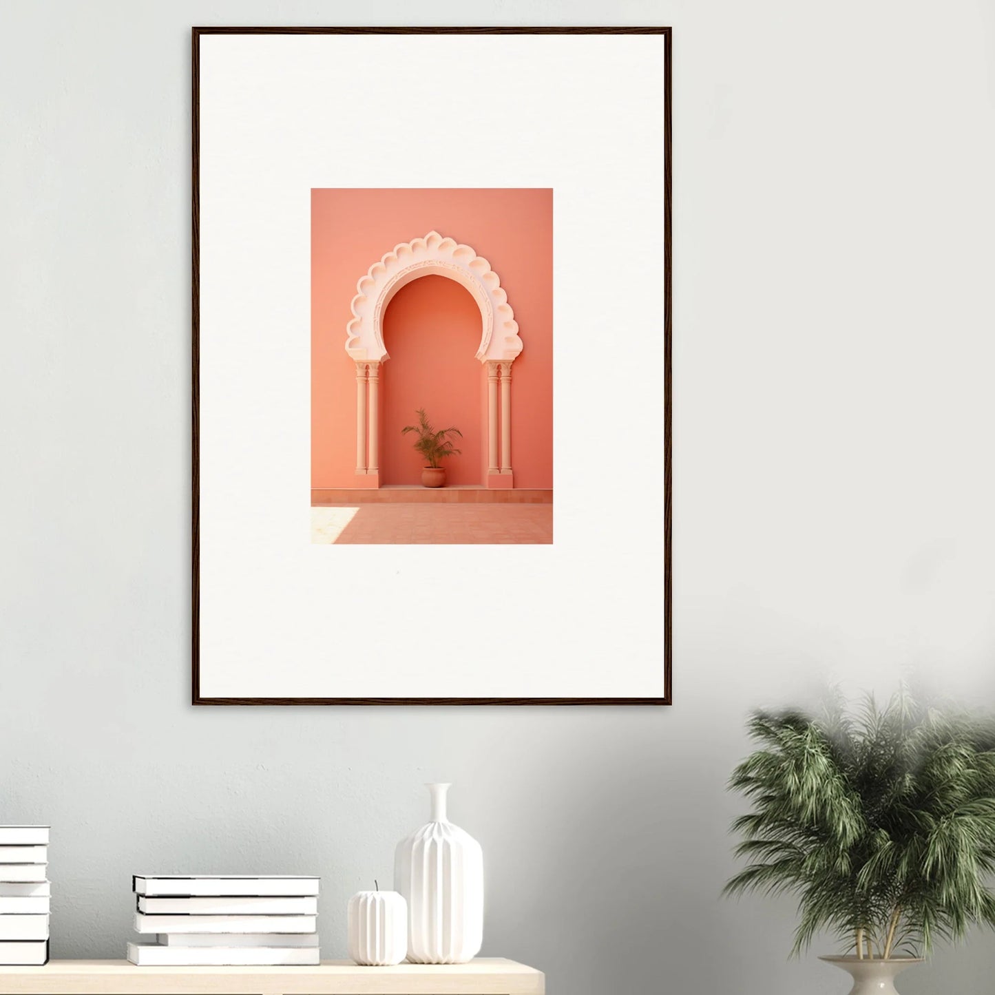 Framed wall art of a coral-colored archway in the Narco Échappatoire Portal design