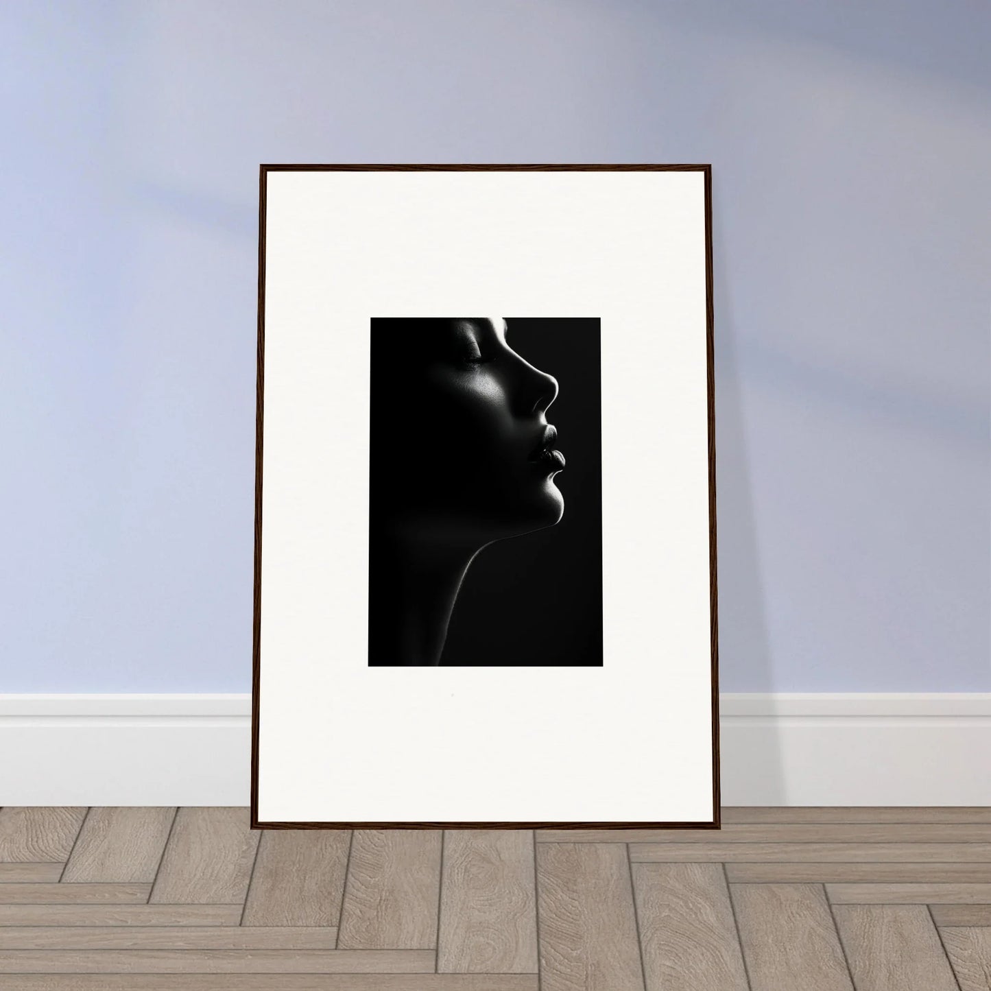 Framed black and white portrait with dramatic lighting from Silhouette’s Siren special edition art™