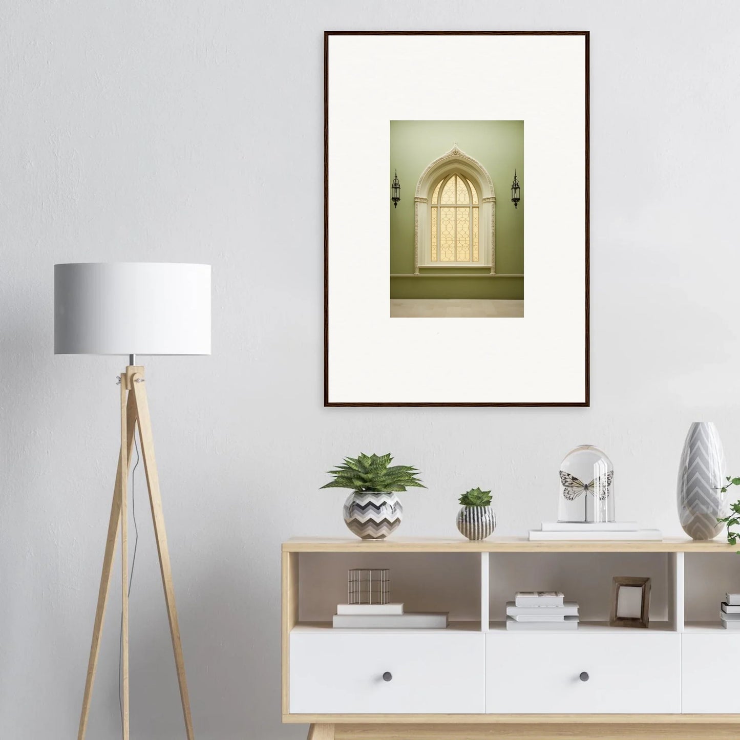 Framed wall art of an arched doorway with sconces in Opalescent Tranquility Dwelling